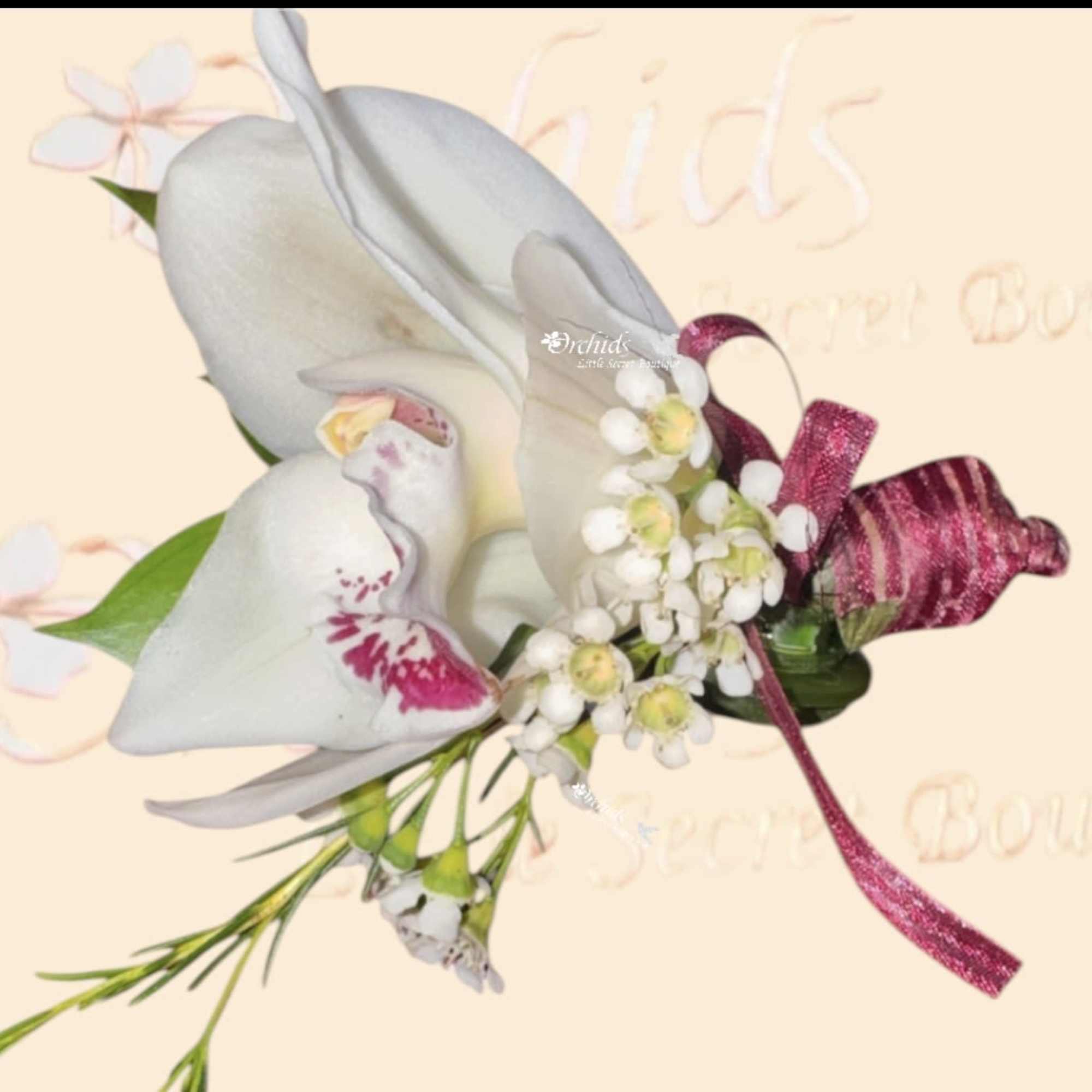 Make a lasting impression with this elegant exotic cymbidium orchid boutonniere, designed, photo 2 of 3