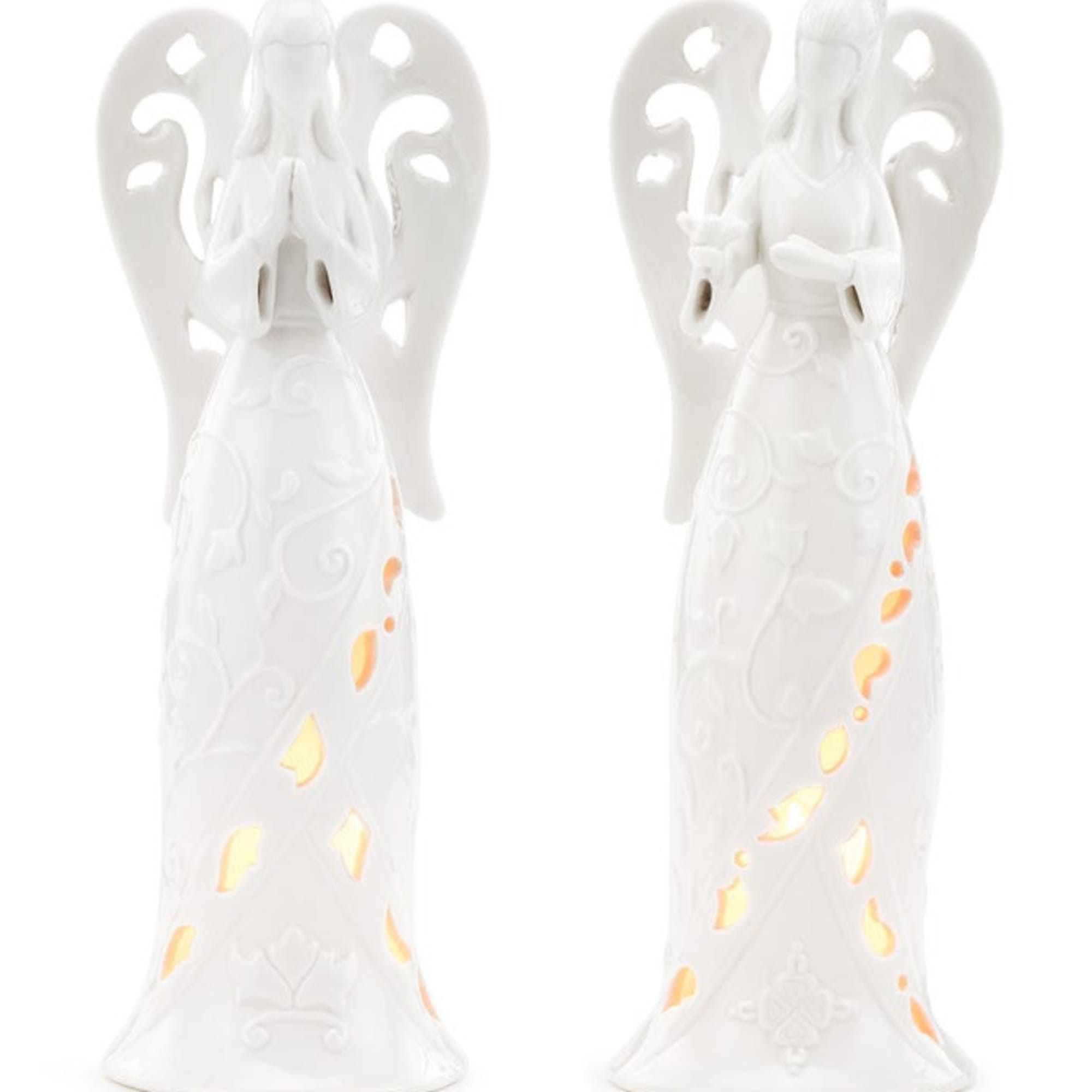 Pair of white ceramic angel figurines with glowing cutout details