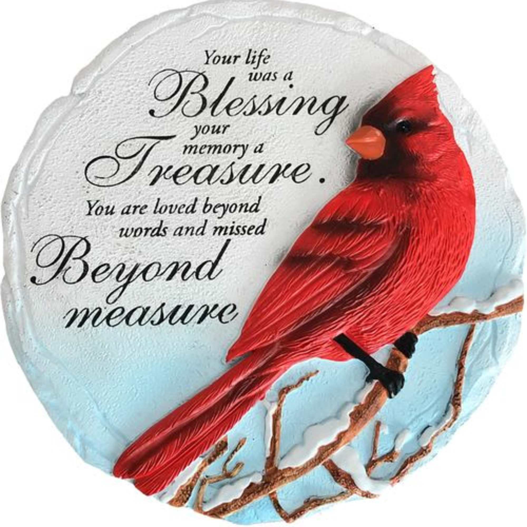 Round memorial plaque with a red cardinal and sympathy text