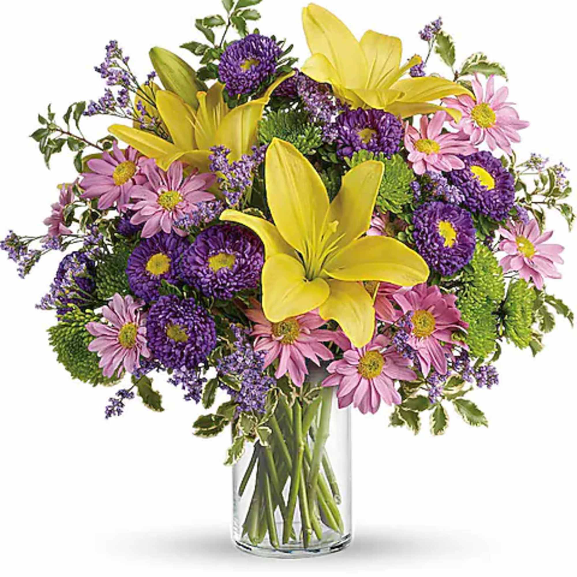 Bouquet of yellow lilies, purple flowers, and pink daisies in a glass vase