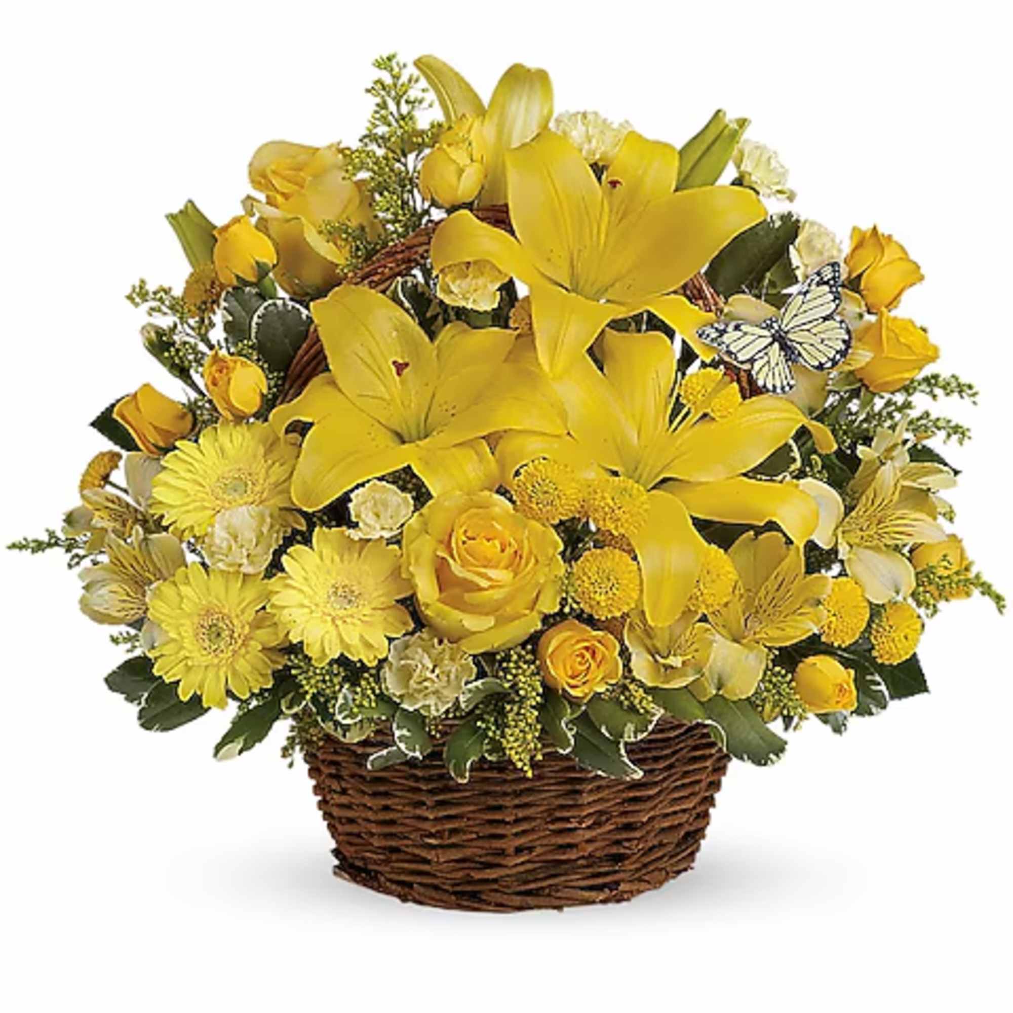 Yellow lilies and roses arranged in a wicker basket