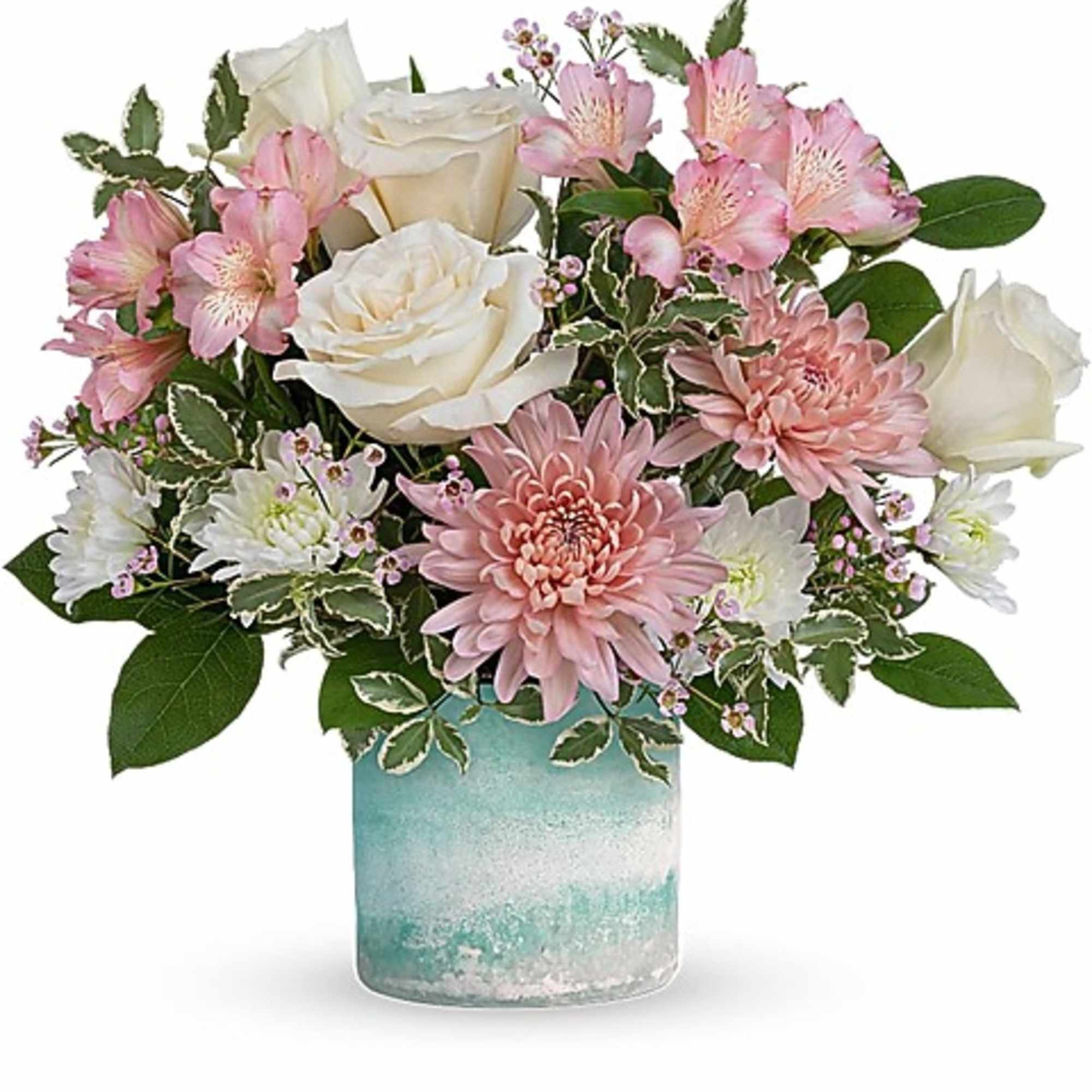 Pink and white flowers arranged in a blue glass vase