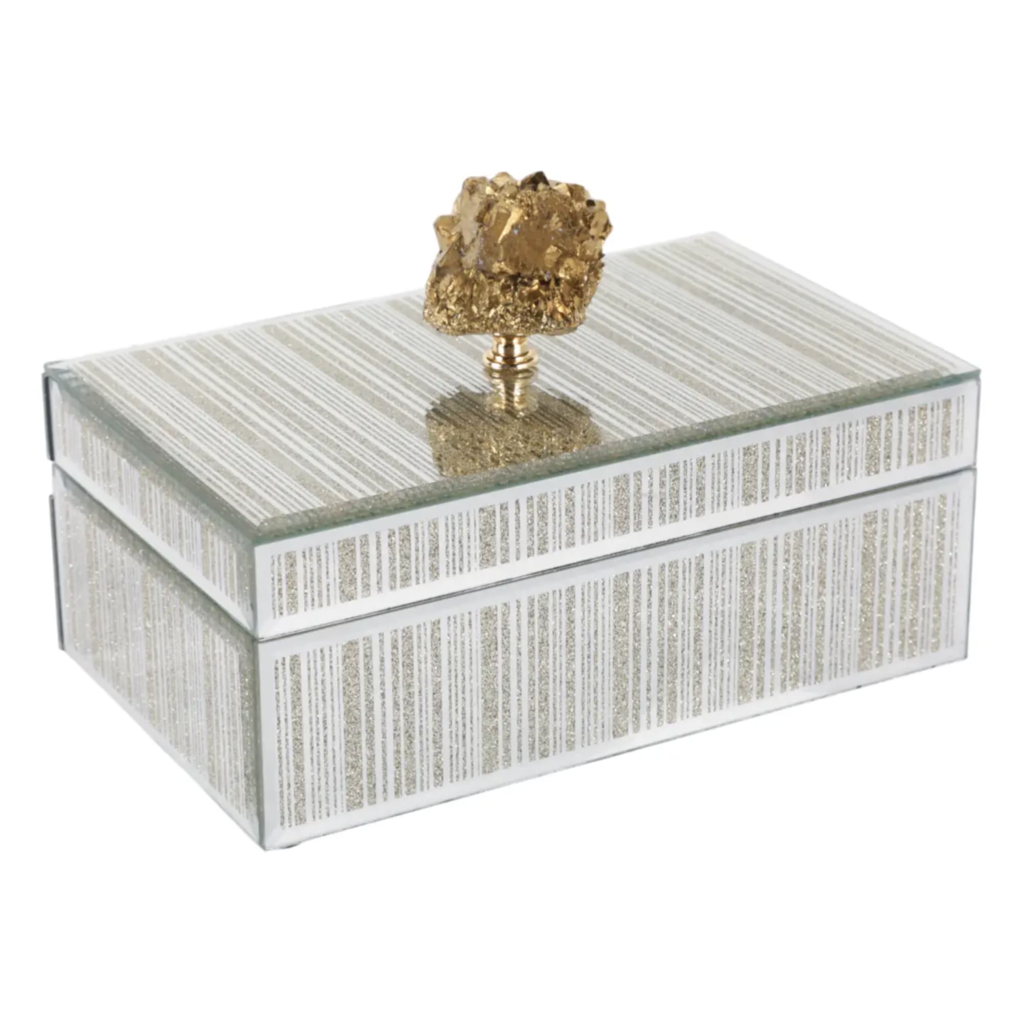 Decorative mirrored box with a gold knob on top