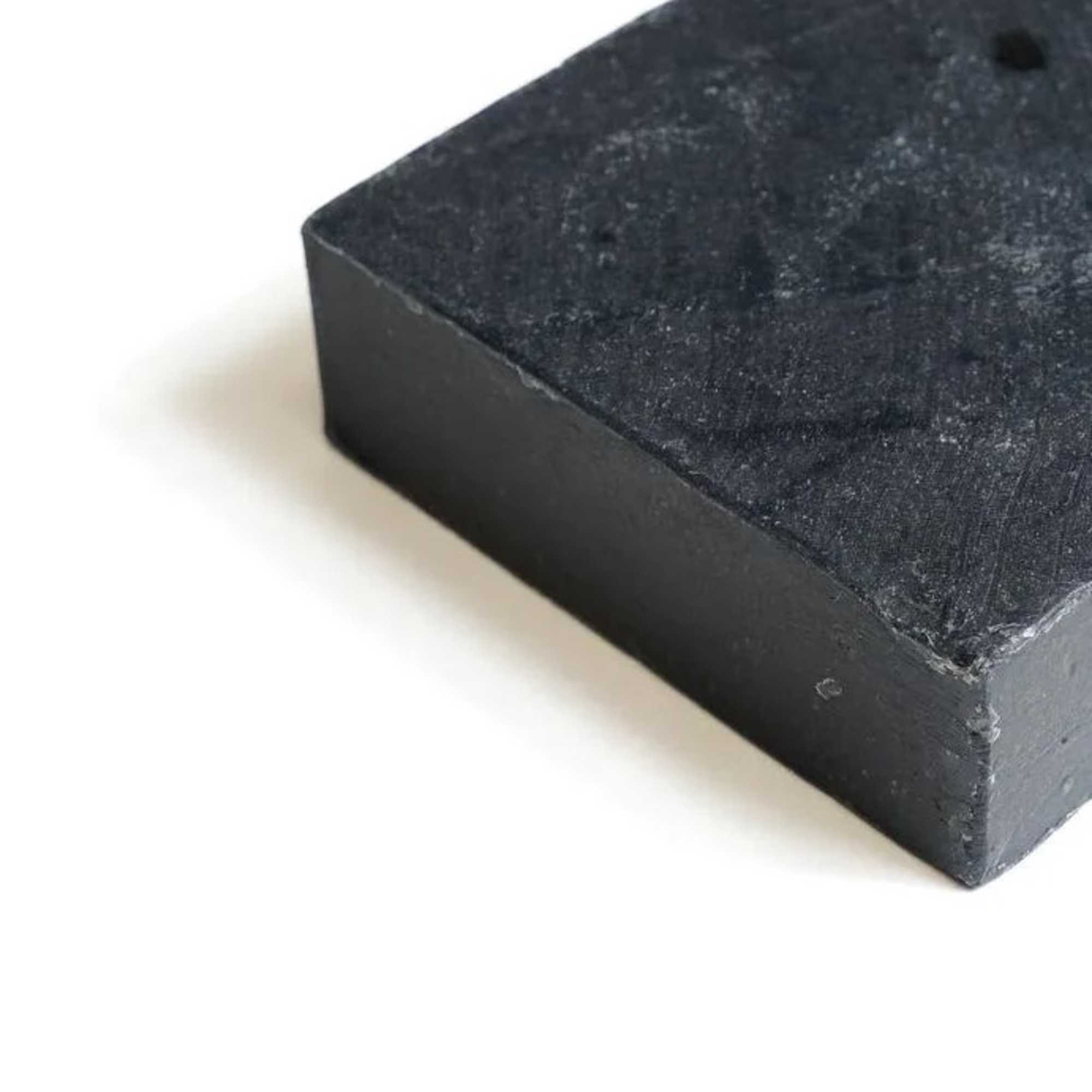 Black rectangular block on a white background
