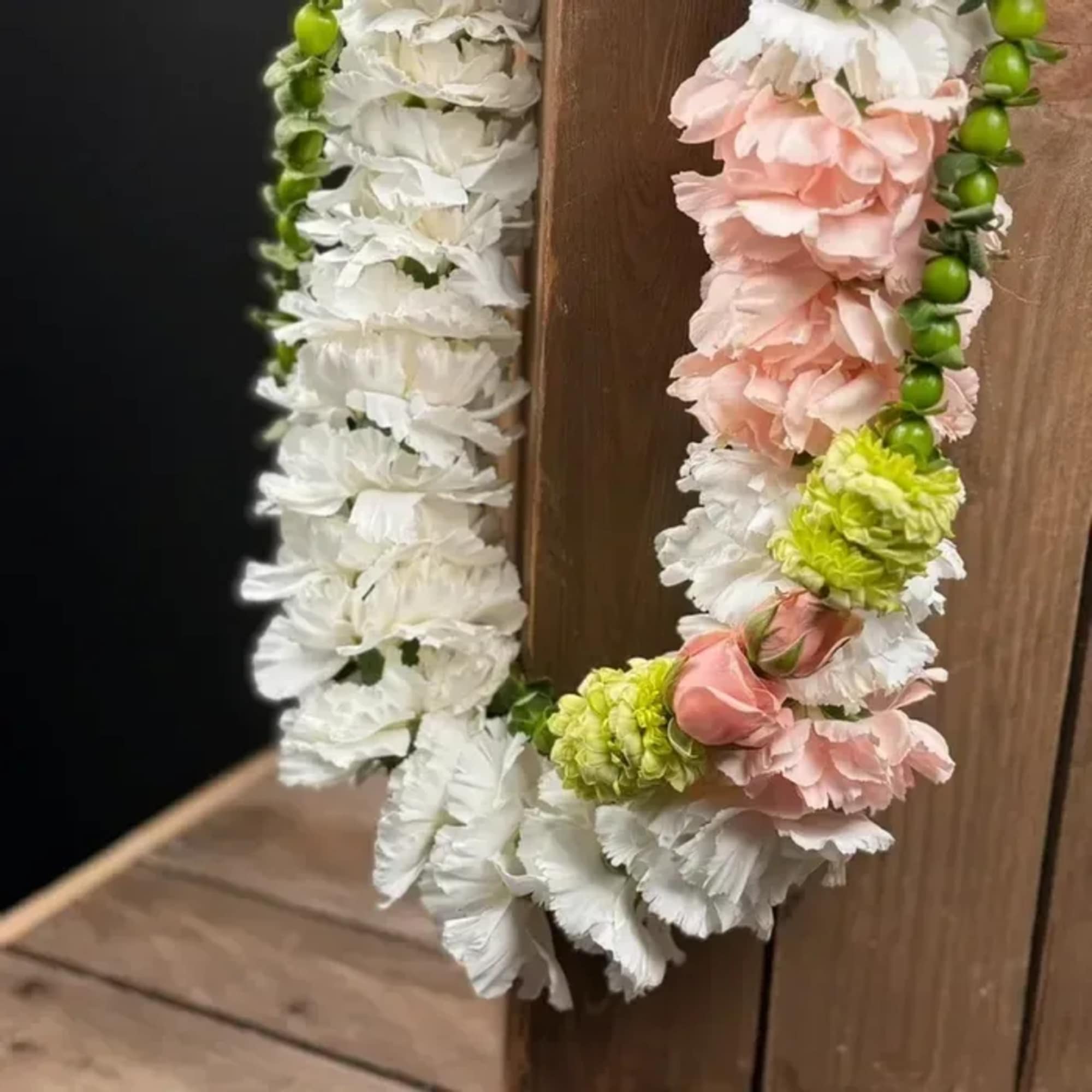 Celebrate life&rsquo;s special moments with our handcrafted fresh carnation leis, a timeless, photo 2 of 3