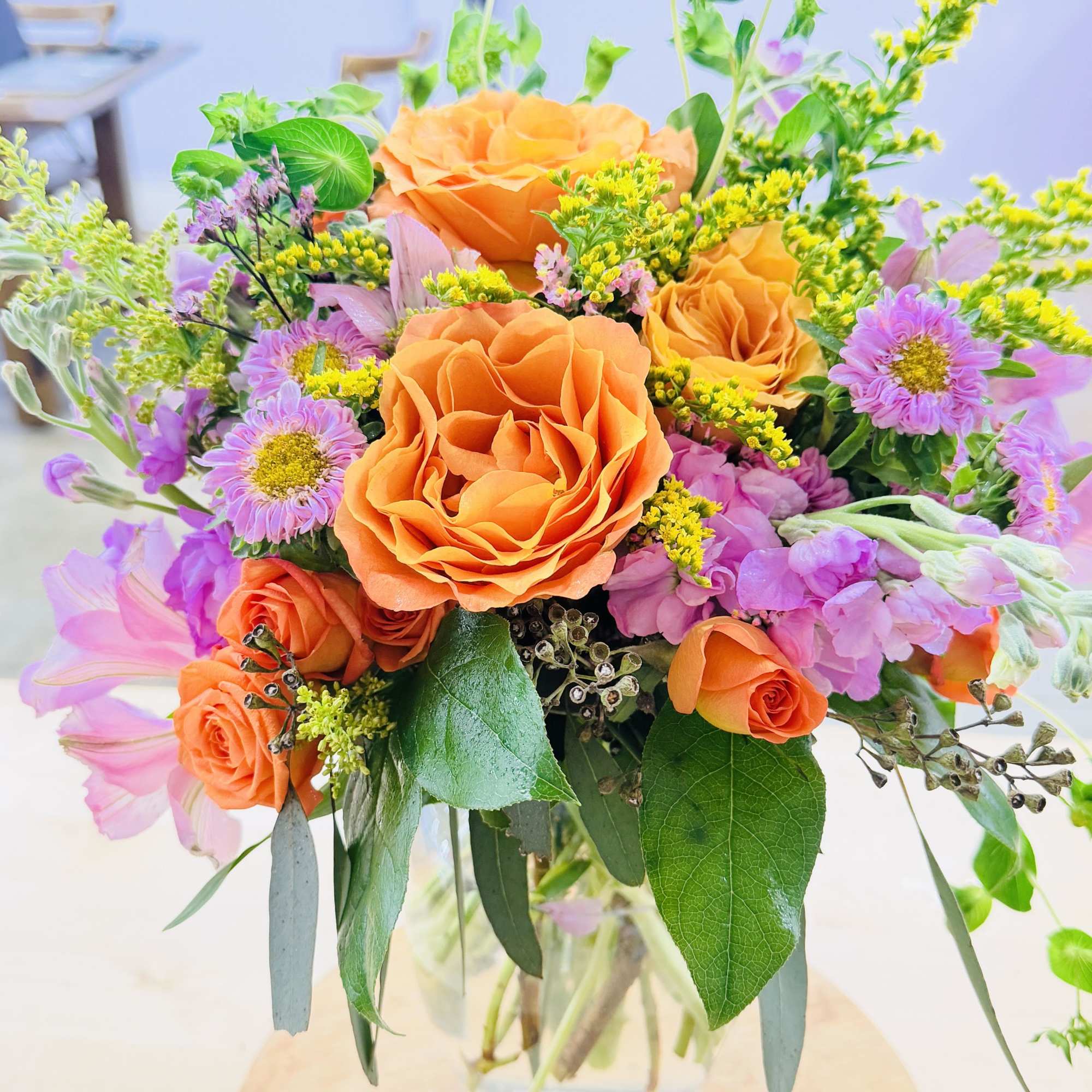 Bursting with bright orange roses, soft alstroemeria and aster, this Life of, photo 2 of 3