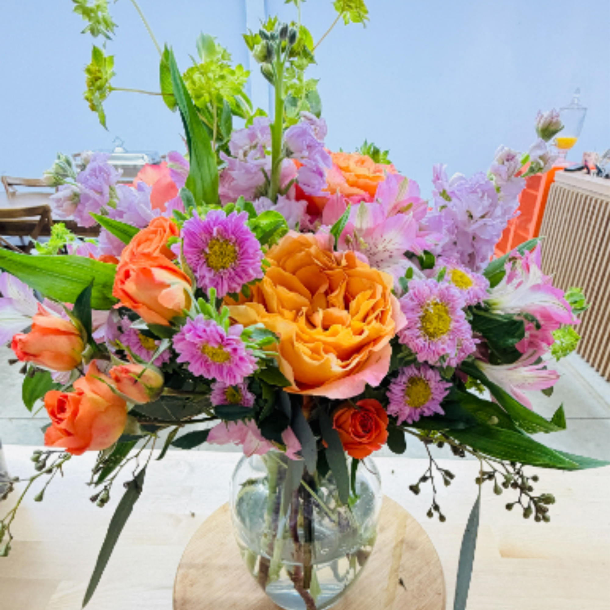 Bursting with bright orange roses, soft alstroemeria and aster, this Life of, photo 3 of 3