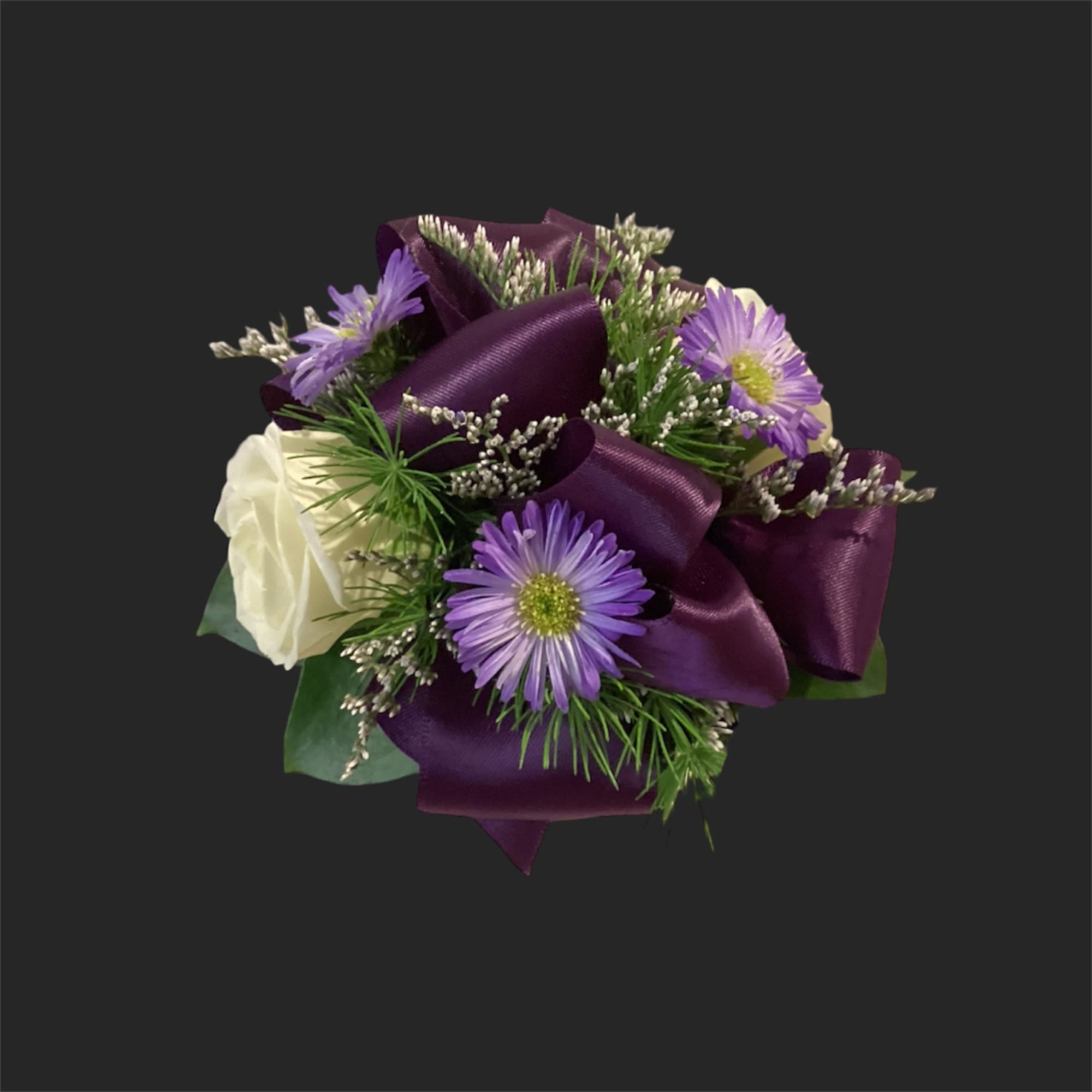 Purple and white bouquet with ribbon wrap and small daisy-like flowers