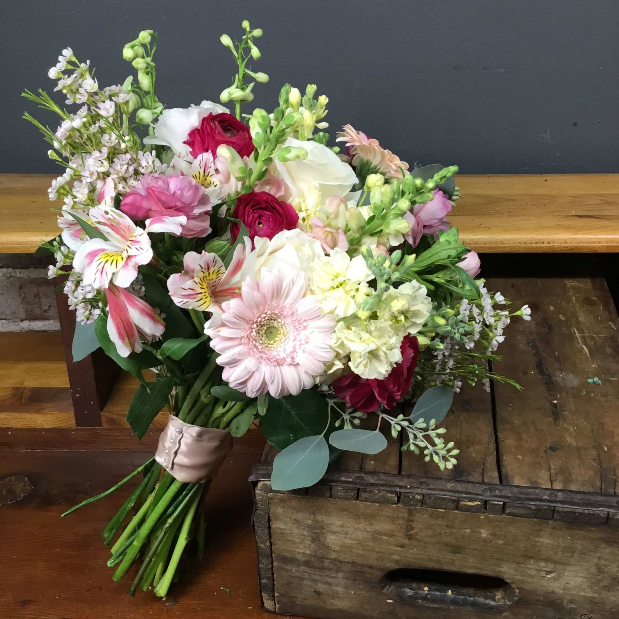 Mixed pink and white bouquet with gerbera daisies and ranunculus