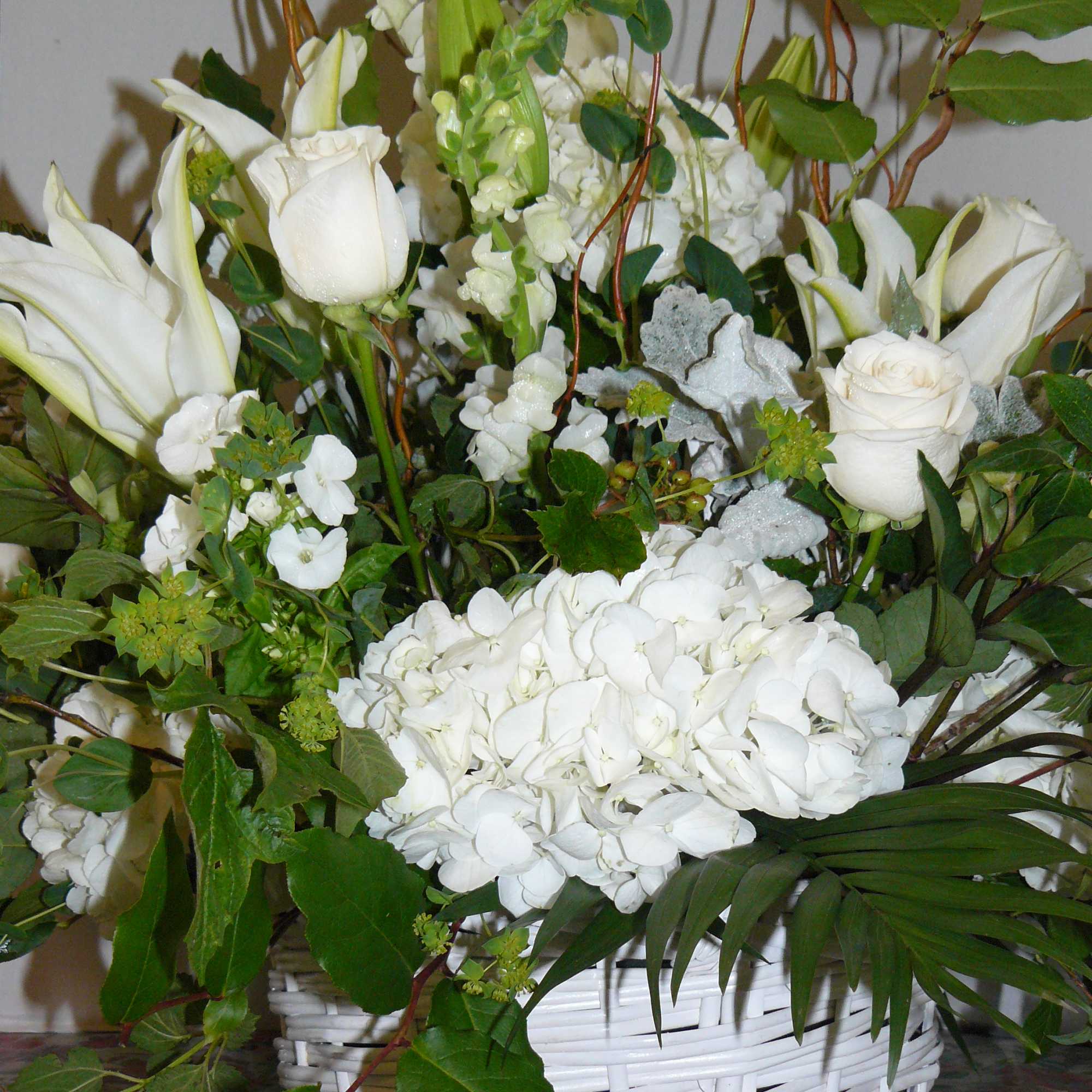 White Hydrangea, Lilies, Roses, Curly Willow,  Dusty Miller,  SnapDragons, Hypericum