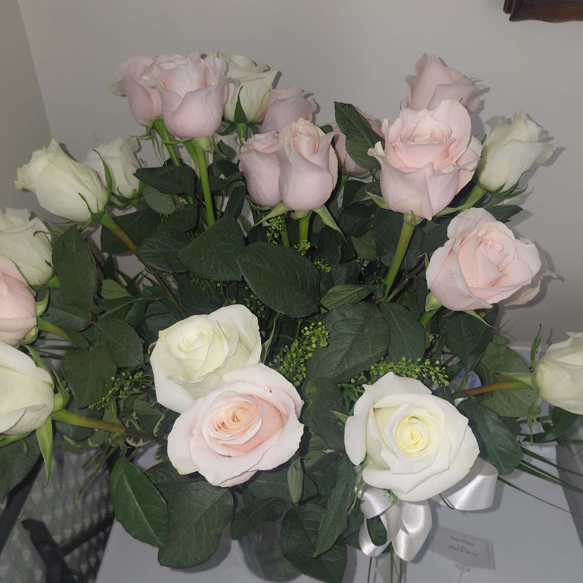 Picture  has Assorted Patel Colored  Roses  in a Tall, photo 2 of 3