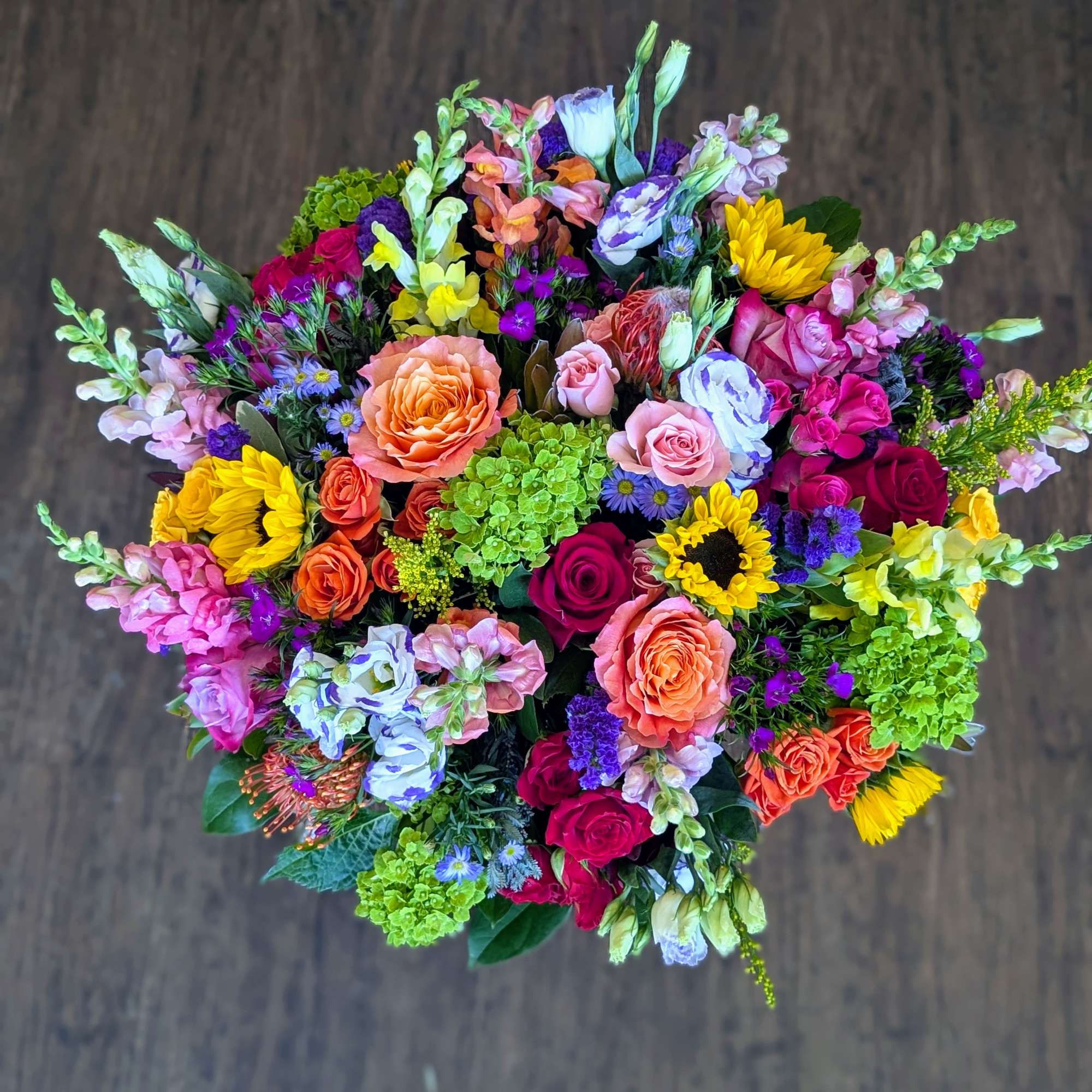 A lavish, garden-inspired statement arrangement designed to make someone feel truly celebrated, photo 3 of 3