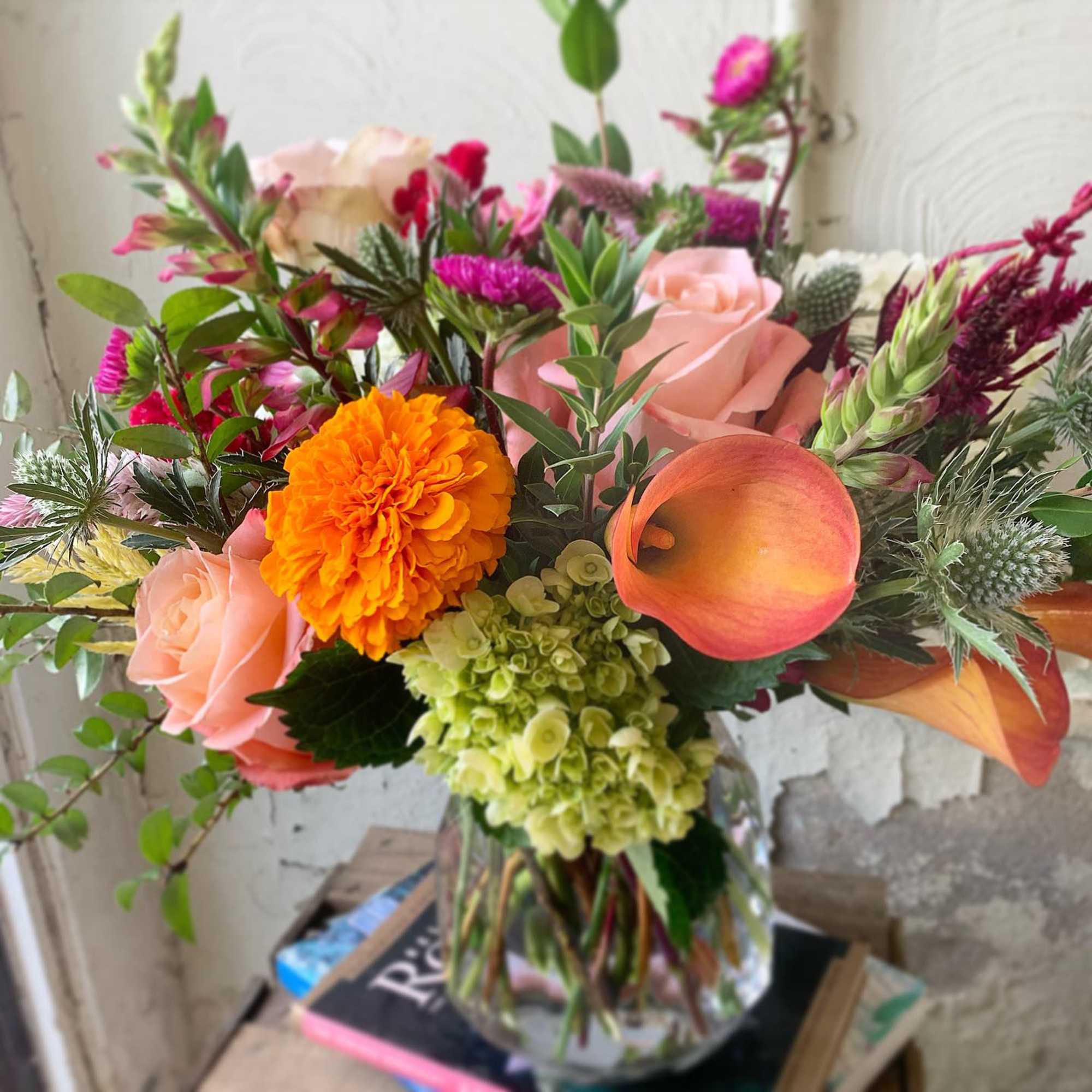 Celebrate good times with this lively bouquet. The arrangement includes roses, carnations