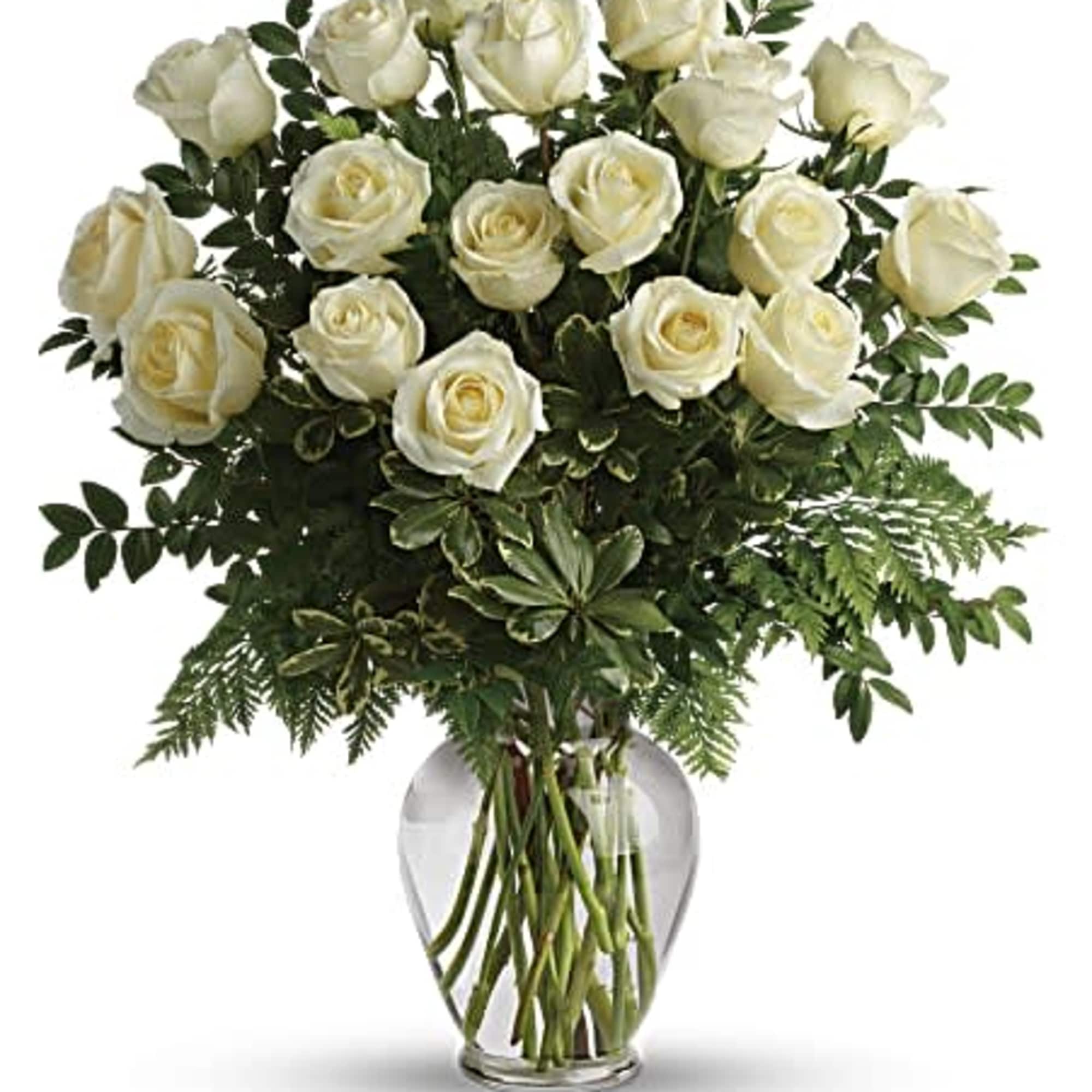 Bouquet of white roses in a clear glass vase