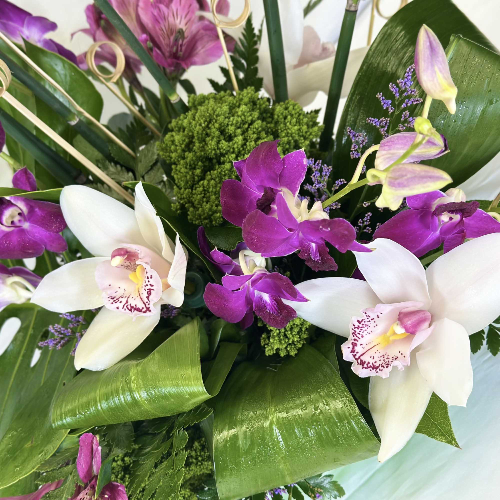 This is an absolutely stunning design featuring dendrobium and cymbidium orchids. The, photo 2 of 4