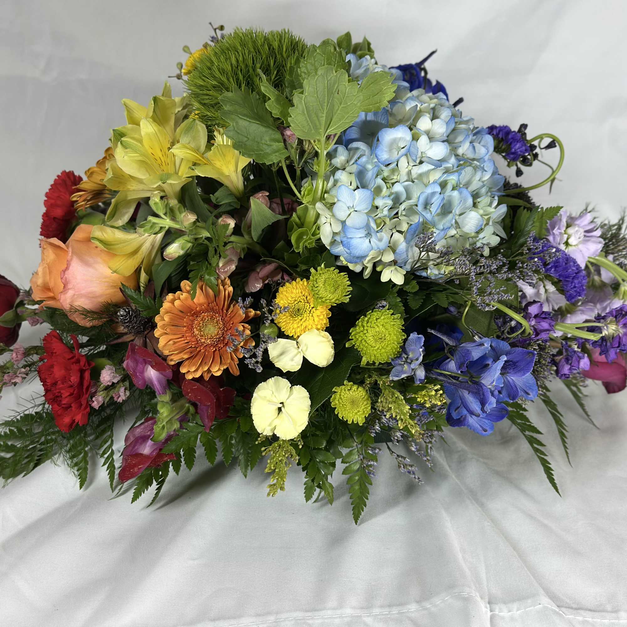We love chasing rainbows. This Leary's flowers exclusive design features red, orange, photo 2 of 4