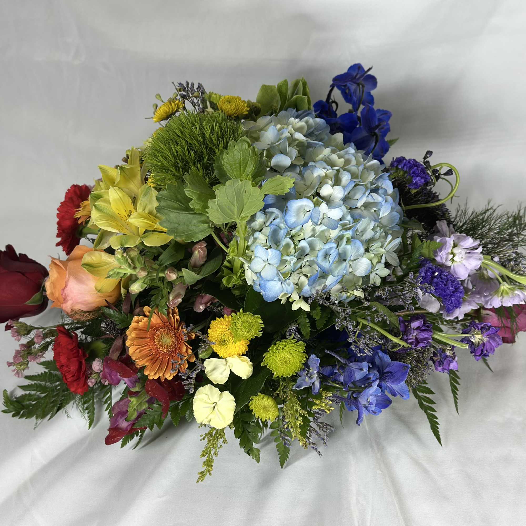 We love chasing rainbows. This Leary's flowers exclusive design features red, orange, photo 4 of 4