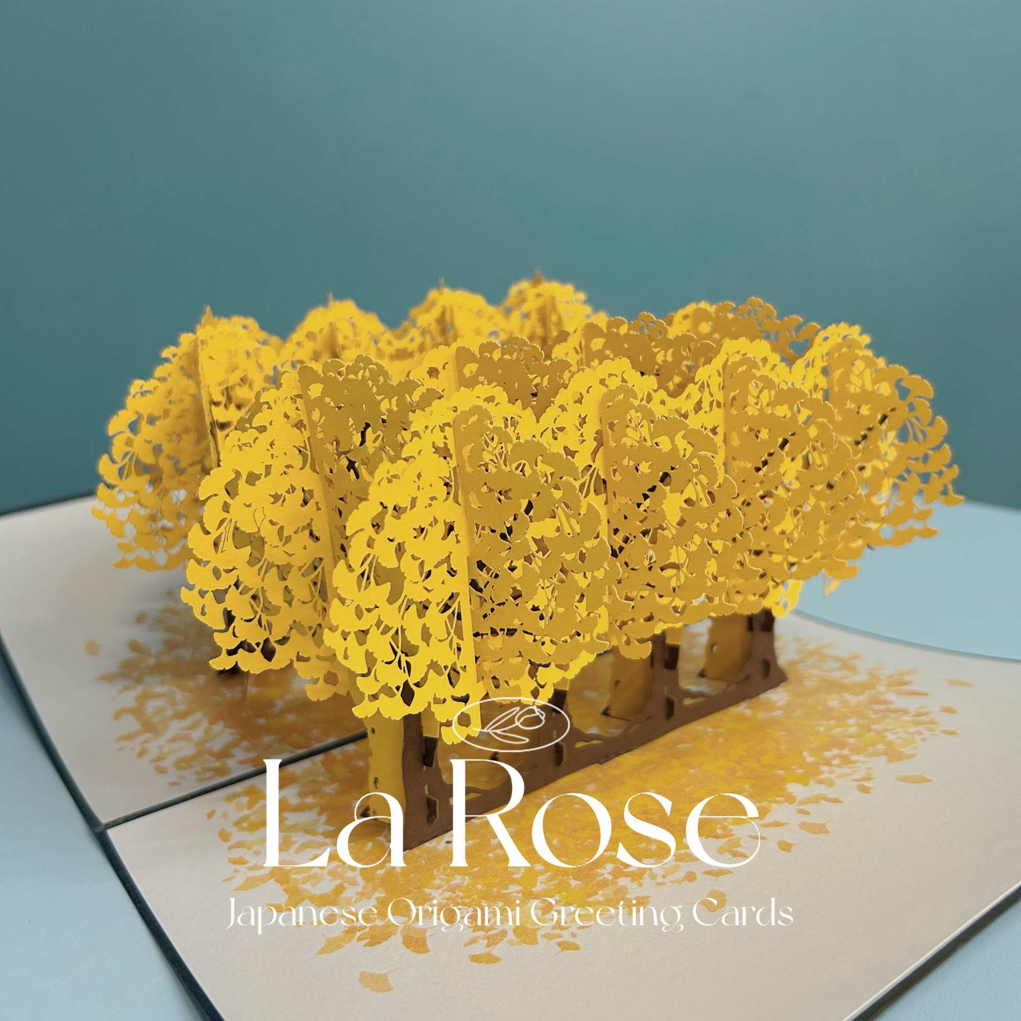 Yellow pop-up greeting card with a tree-like paper cutout