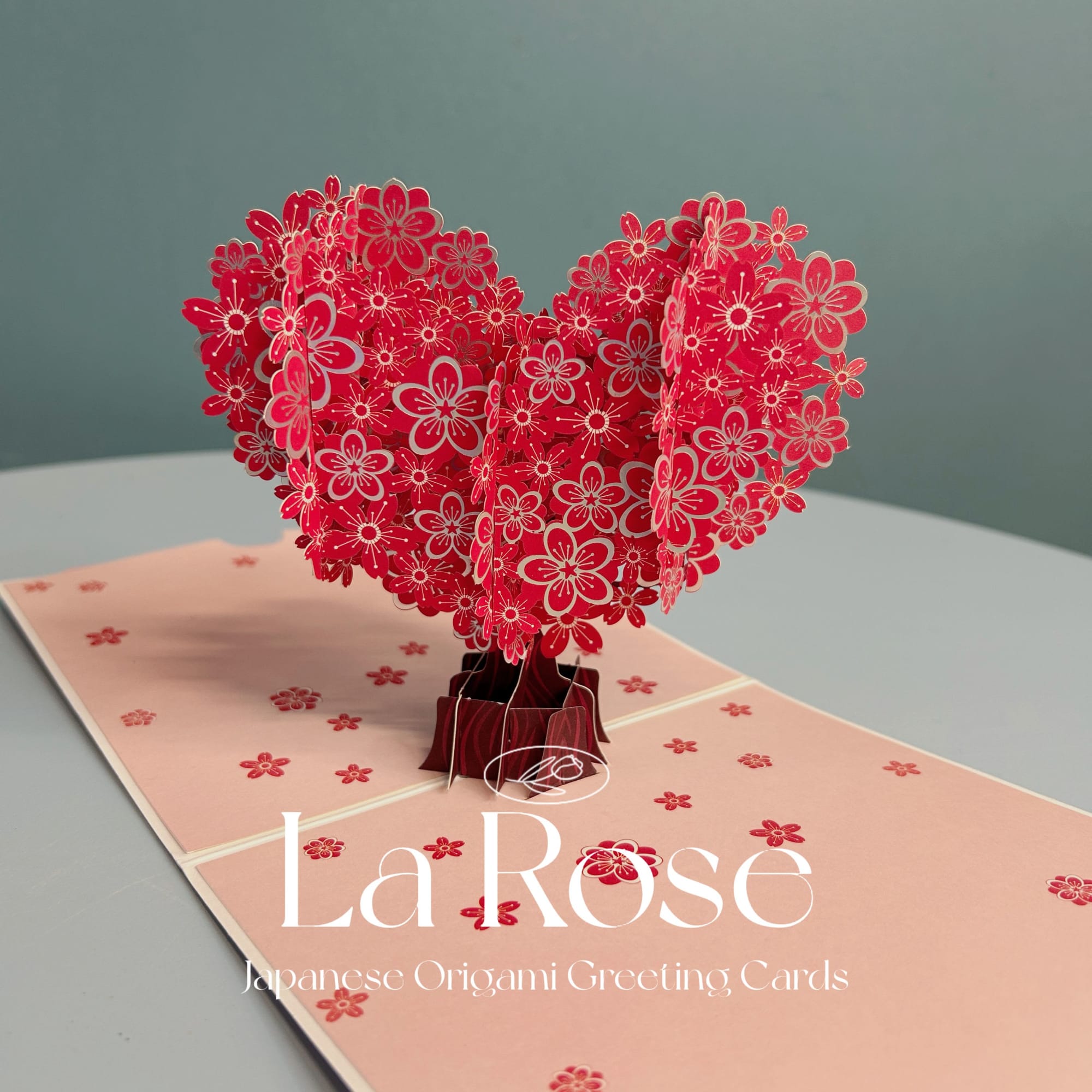 Red pop-up paper flower card shaped like a heart
