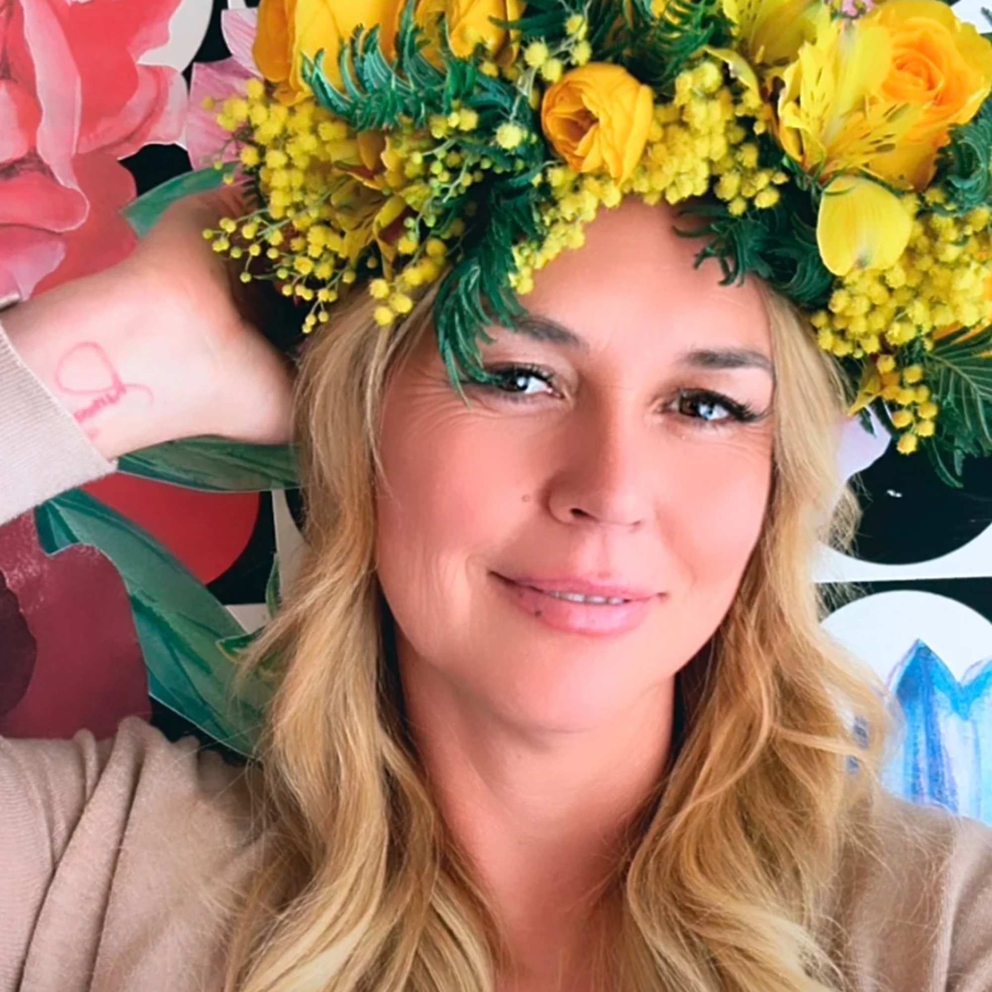 Woman wearing a yellow and pink flower crown