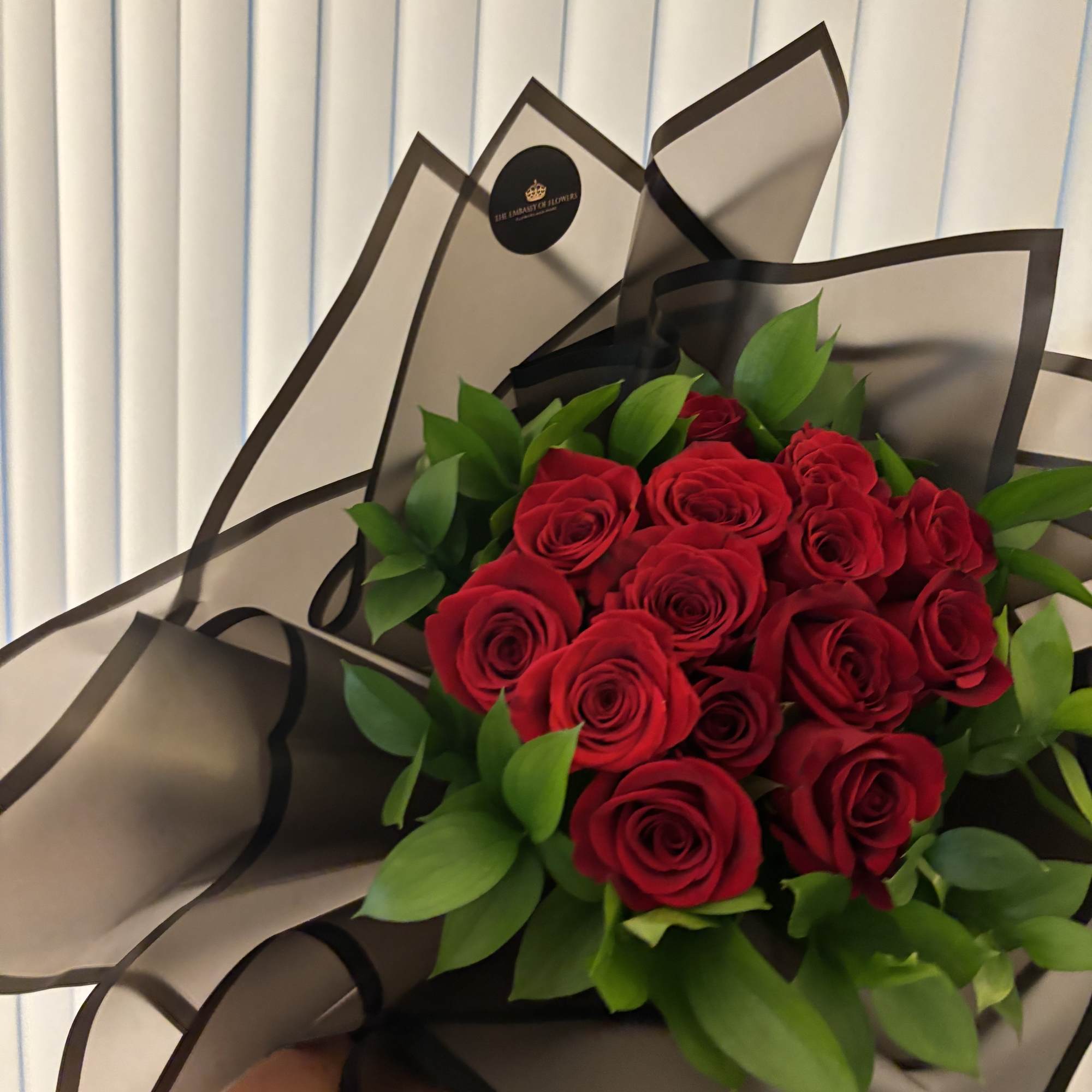 Beautiful fresh roses, wrapped in Korean-style paper. You may request your favorite