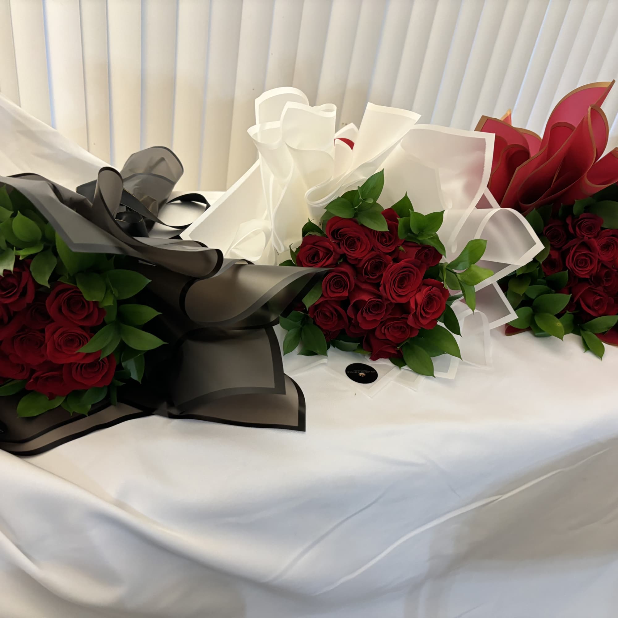 Beautiful fresh roses, wrapped in Korean-style paper. You may request your favorite, photo 4 of 4