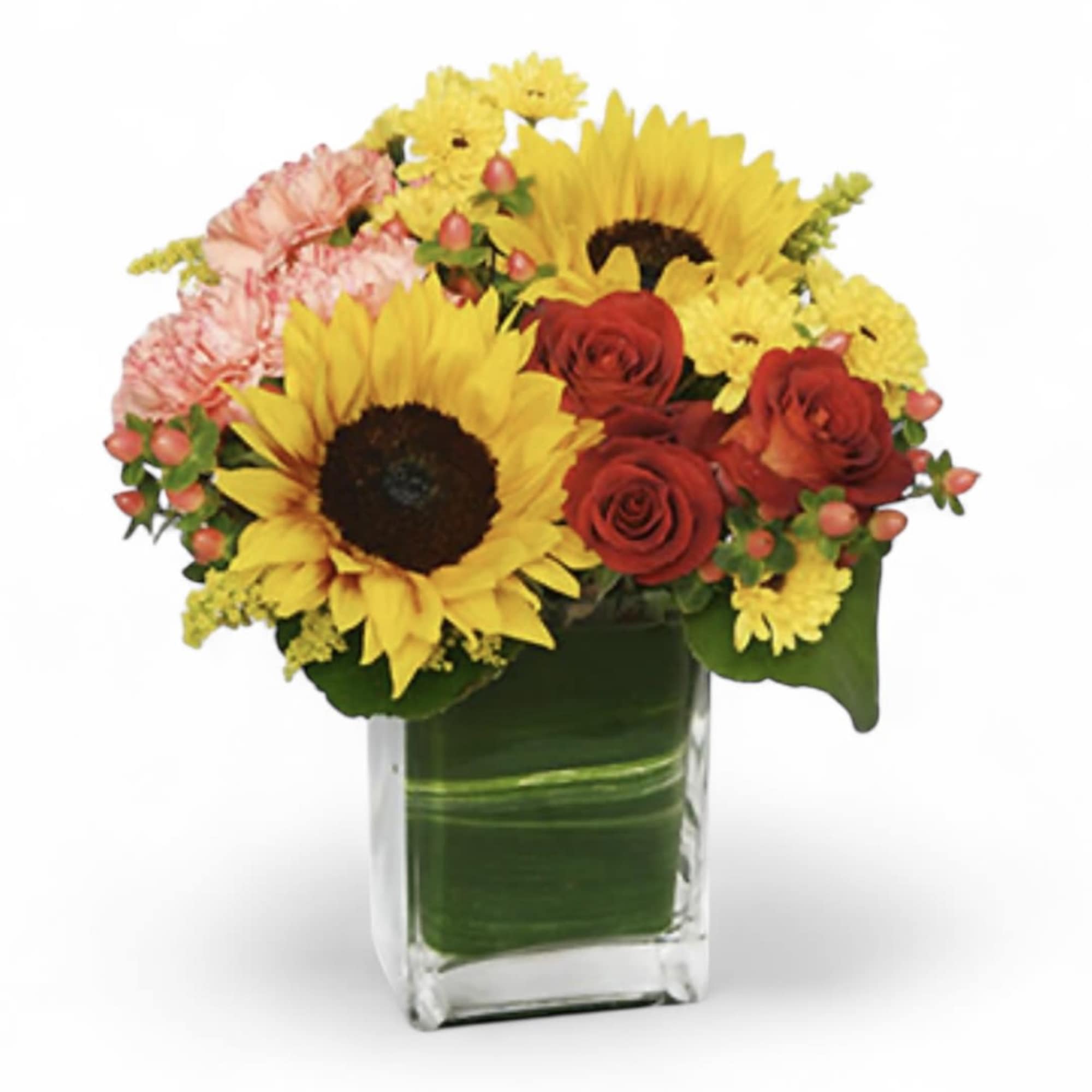 Bouquet of sunflowers, red roses, and pink carnations in a glass vase