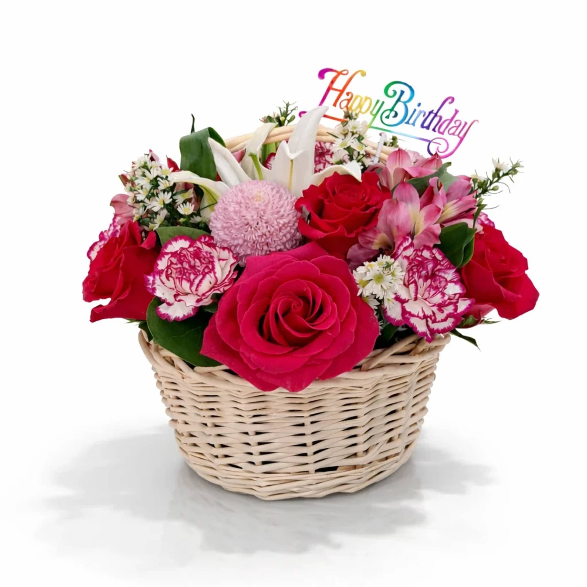 Basket arrangement of pink and red flowers with a Happy Birthday topper
