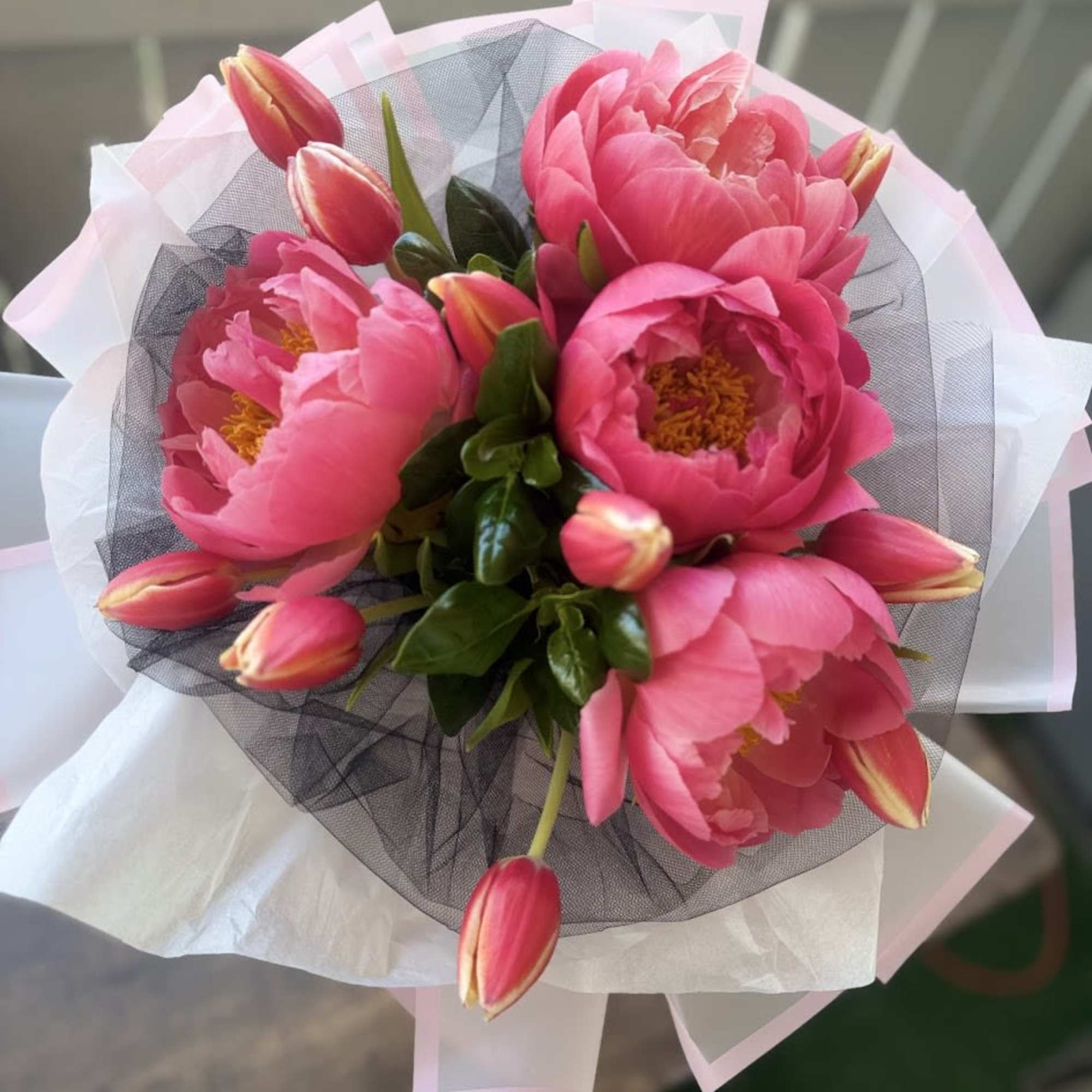 A delicate arrangement of fresh peonies and tulips wrapped in elegant Korean-style, photo 2 of 4