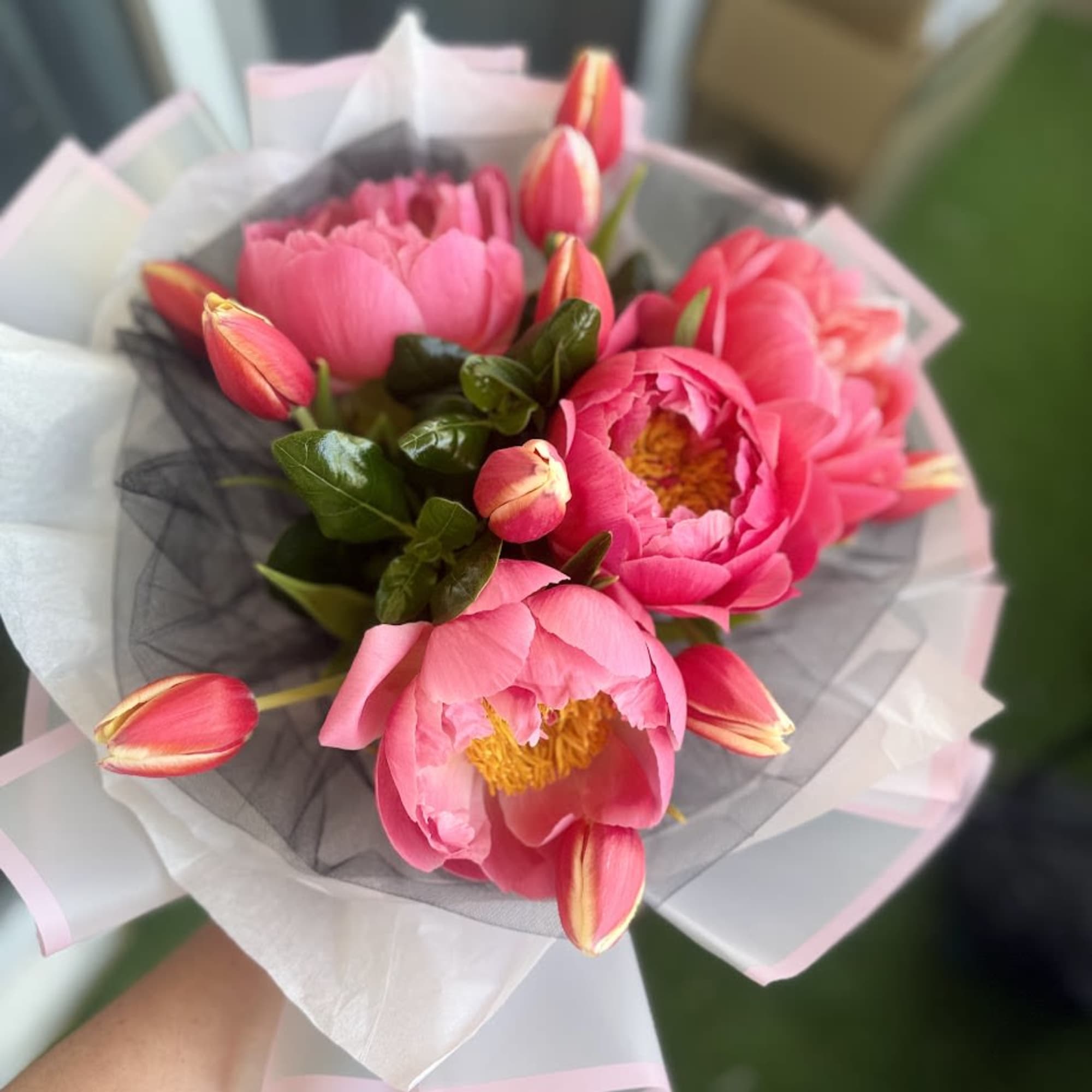 A delicate arrangement of fresh peonies and tulips wrapped in elegant Korean-style, photo 3 of 4