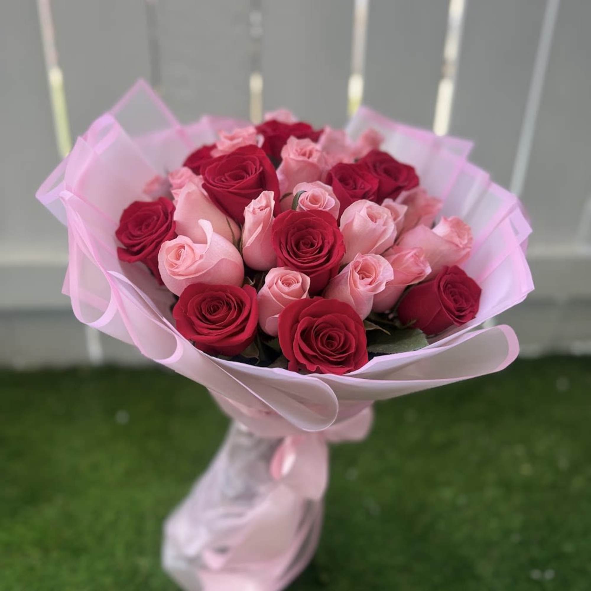 Elegant bouquet featuring 36 stems of red and pink roses, carefully designed, photo 2 of 4