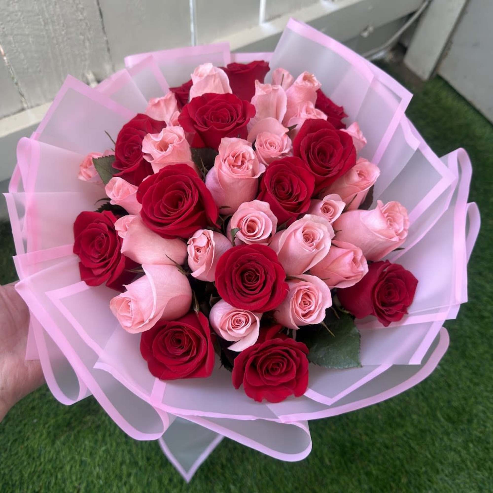Elegant bouquet featuring 36 stems of red and pink roses, carefully designed, photo 3 of 4