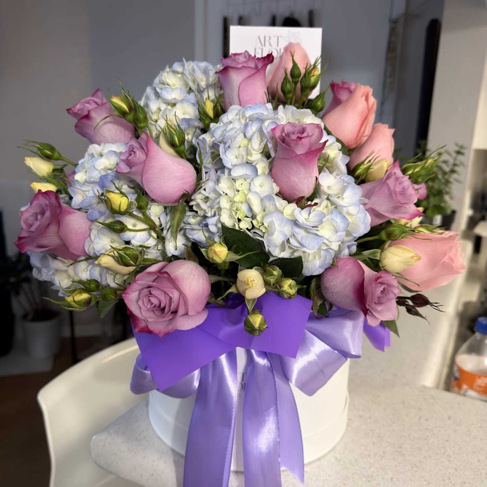 An elegant flower box featuring a beautiful blend of lavender roses, pink, photo 4 of 4