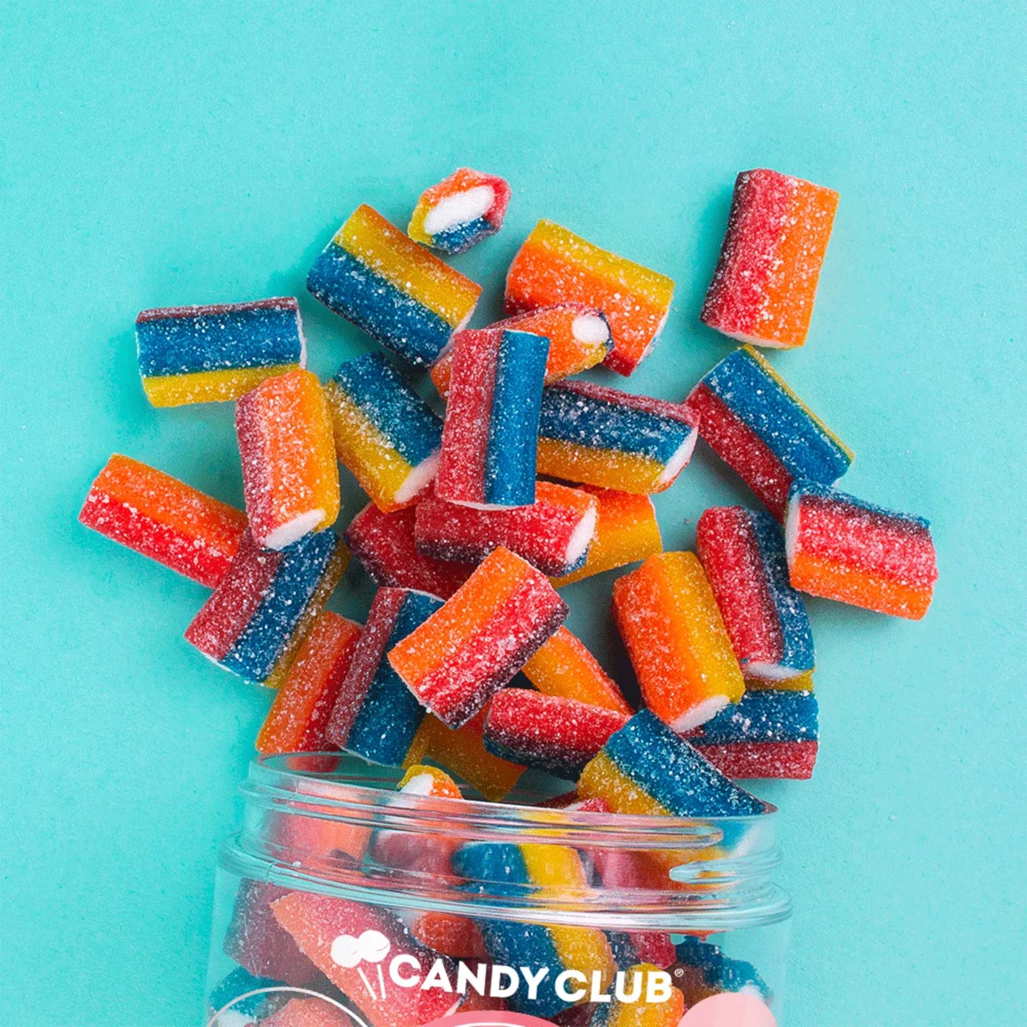 These rainbow roll-ups surround sweet vanilla creme with a colorful band of, photo 2 of 3