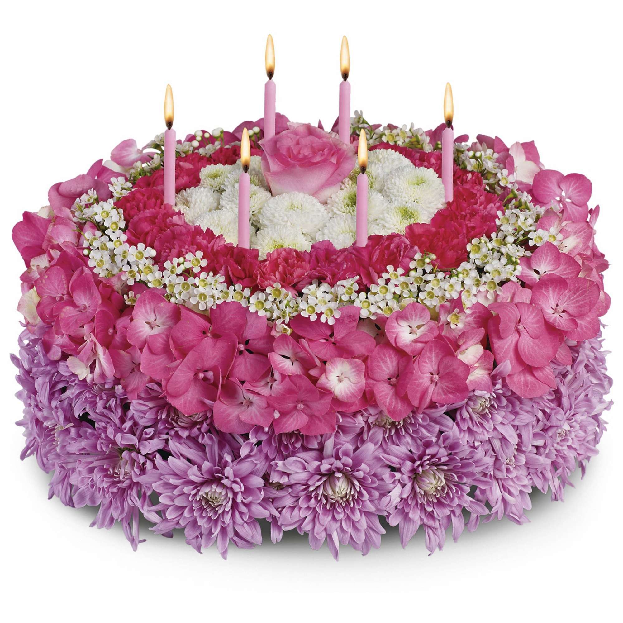 Pink and purple floral cake with lit candles