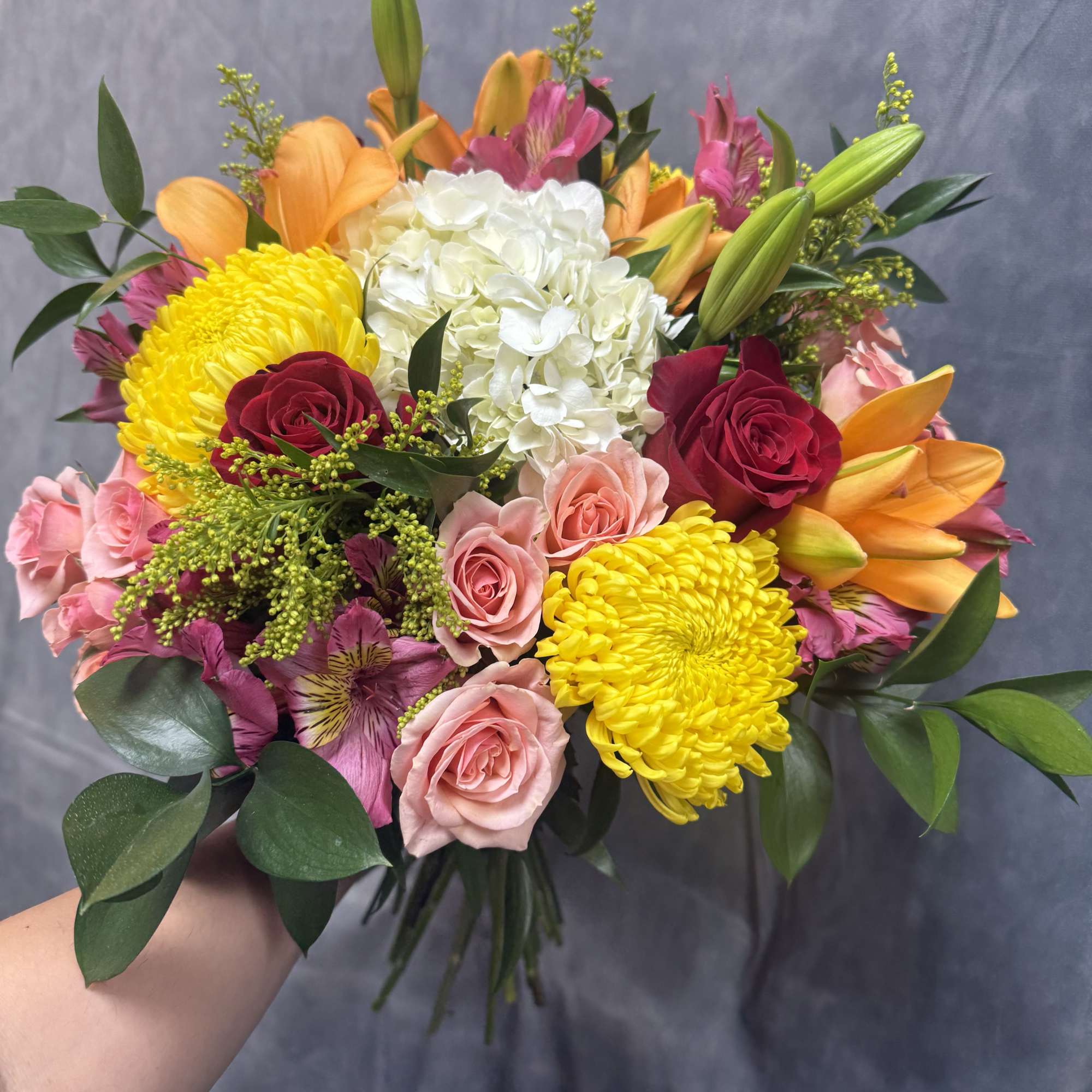 A lively, colorful celebration of roses, lilies, and hydrangeas &mdash; perfect for, photo 2 of 2