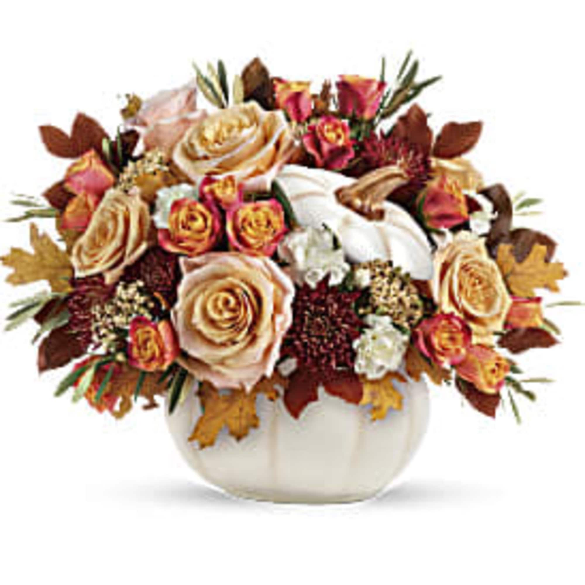 Autumn bouquet of peach and orange roses in a white pumpkin vase