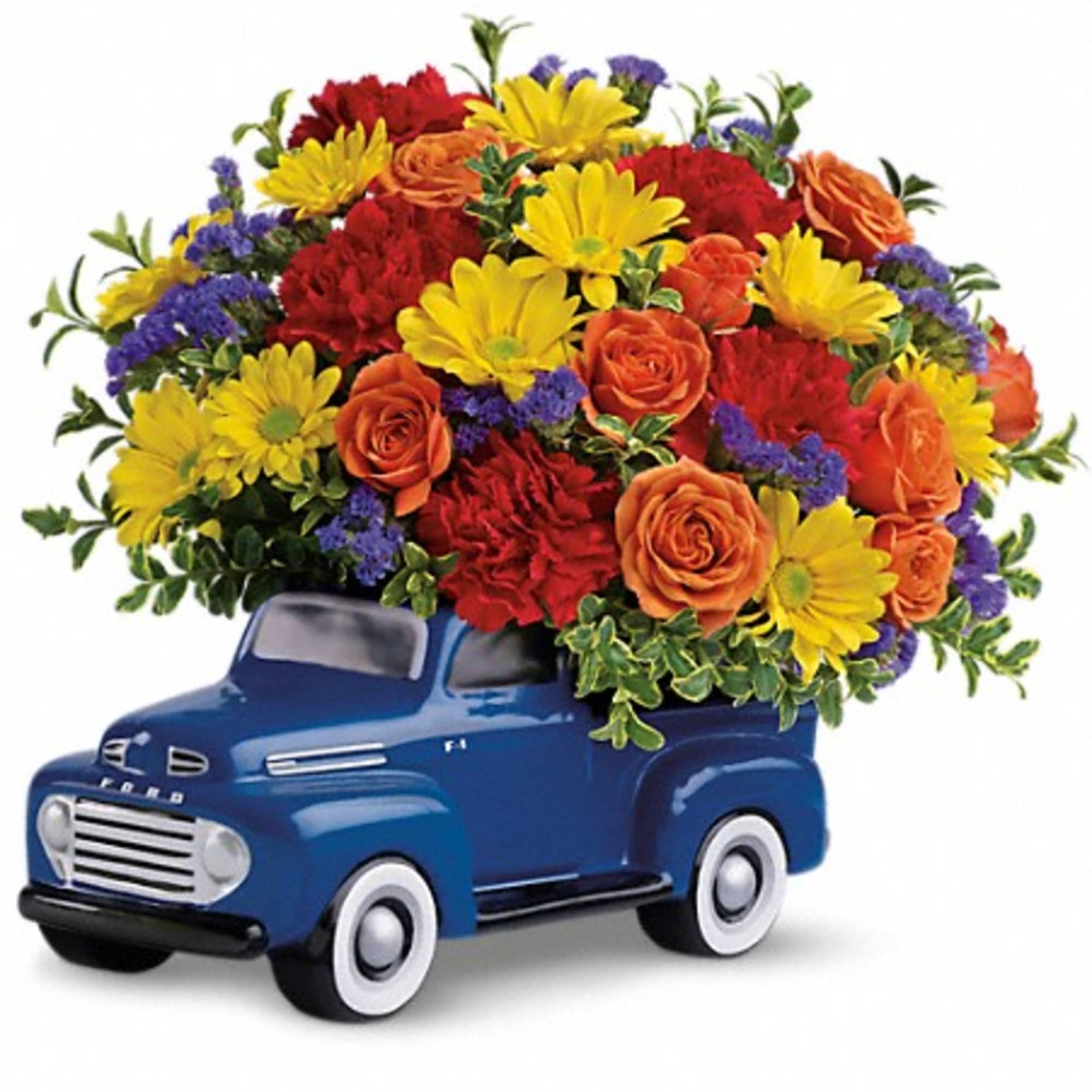 Colorful flower arrangement in a blue toy truck