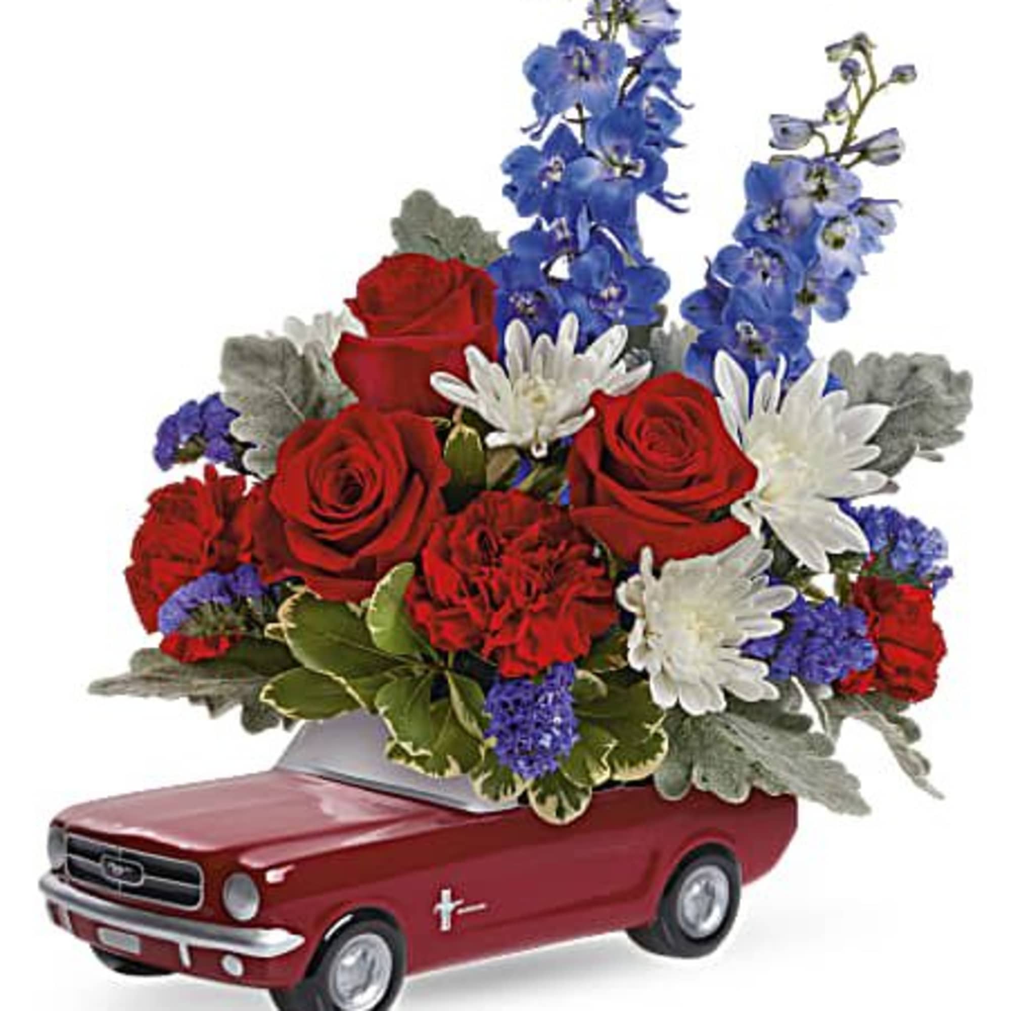 Red roses and white daisies arranged in a red car-shaped container