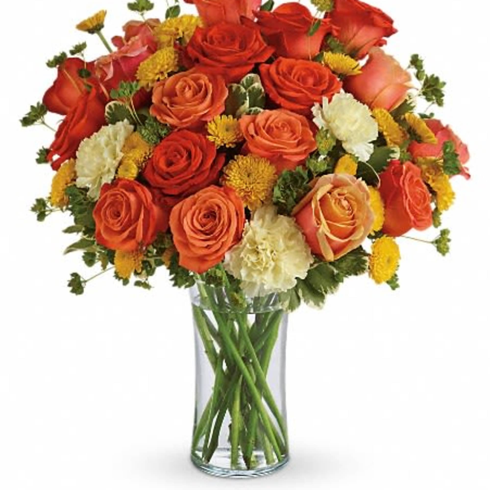 Bouquet of orange and red roses with yellow accents in a clear glass vase