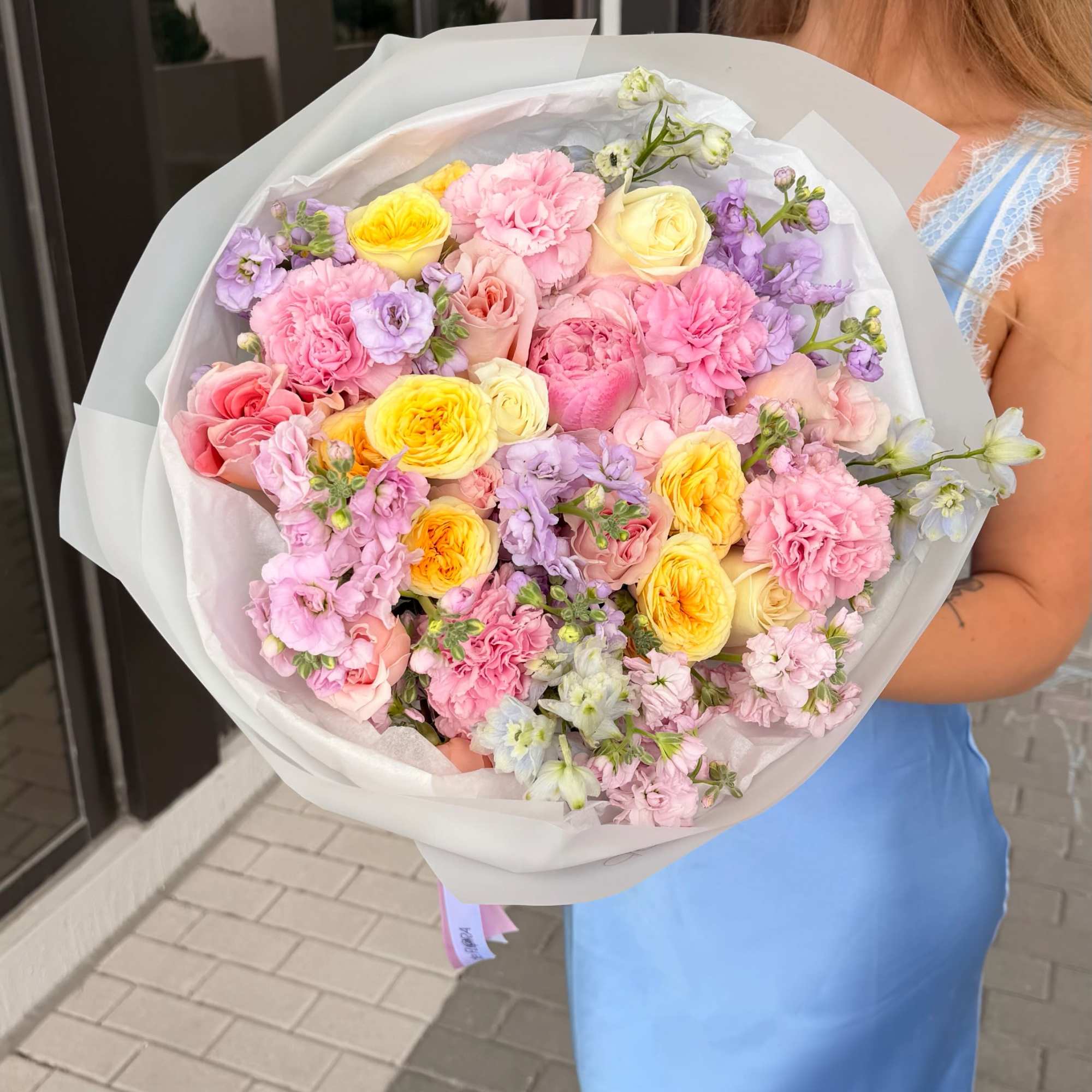 A lush, romantic bouquet designed in soft pastel tones, blending the charm, photo 2 of 3