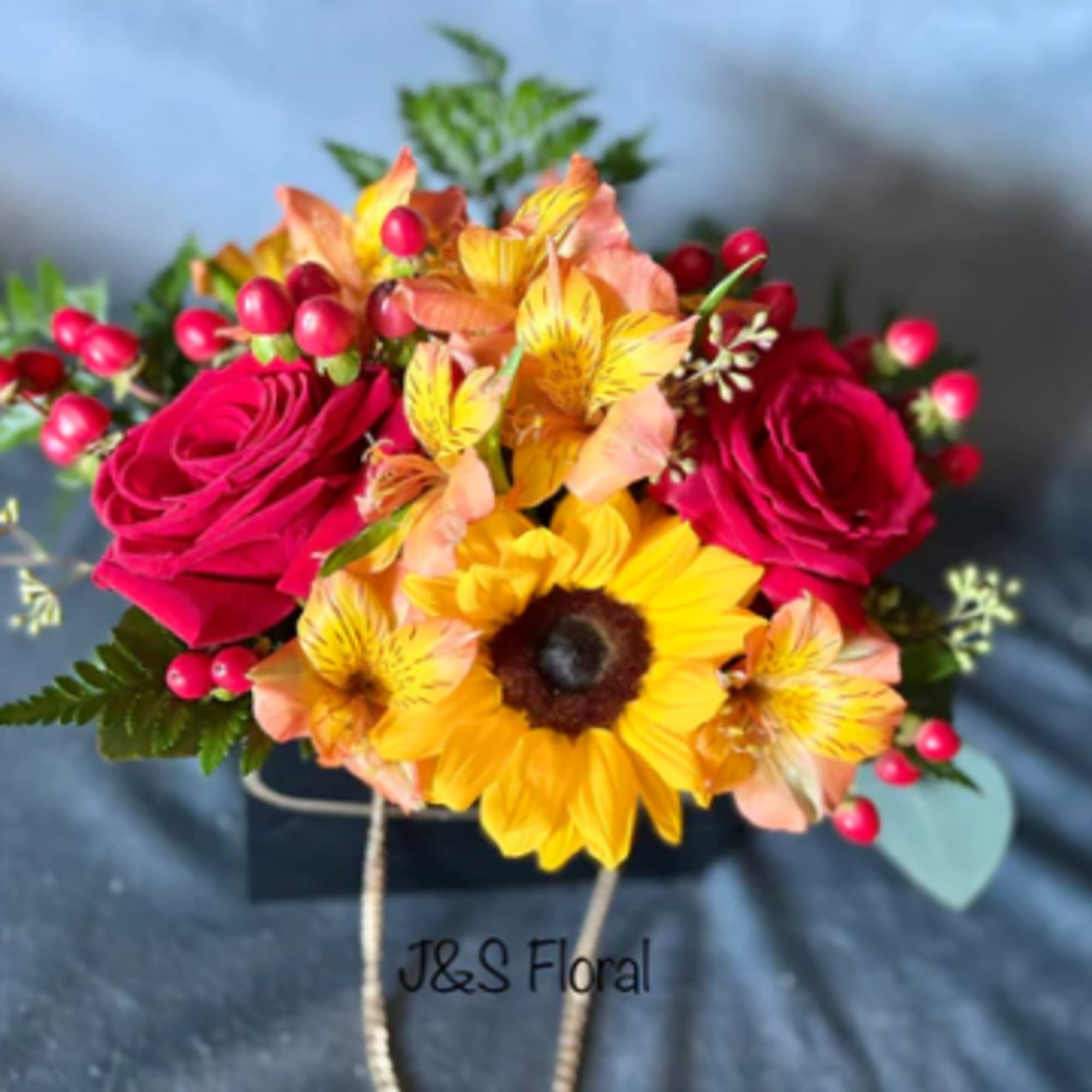 Embrace the radiant spirit of Warmness in a purse! Our captivating flower