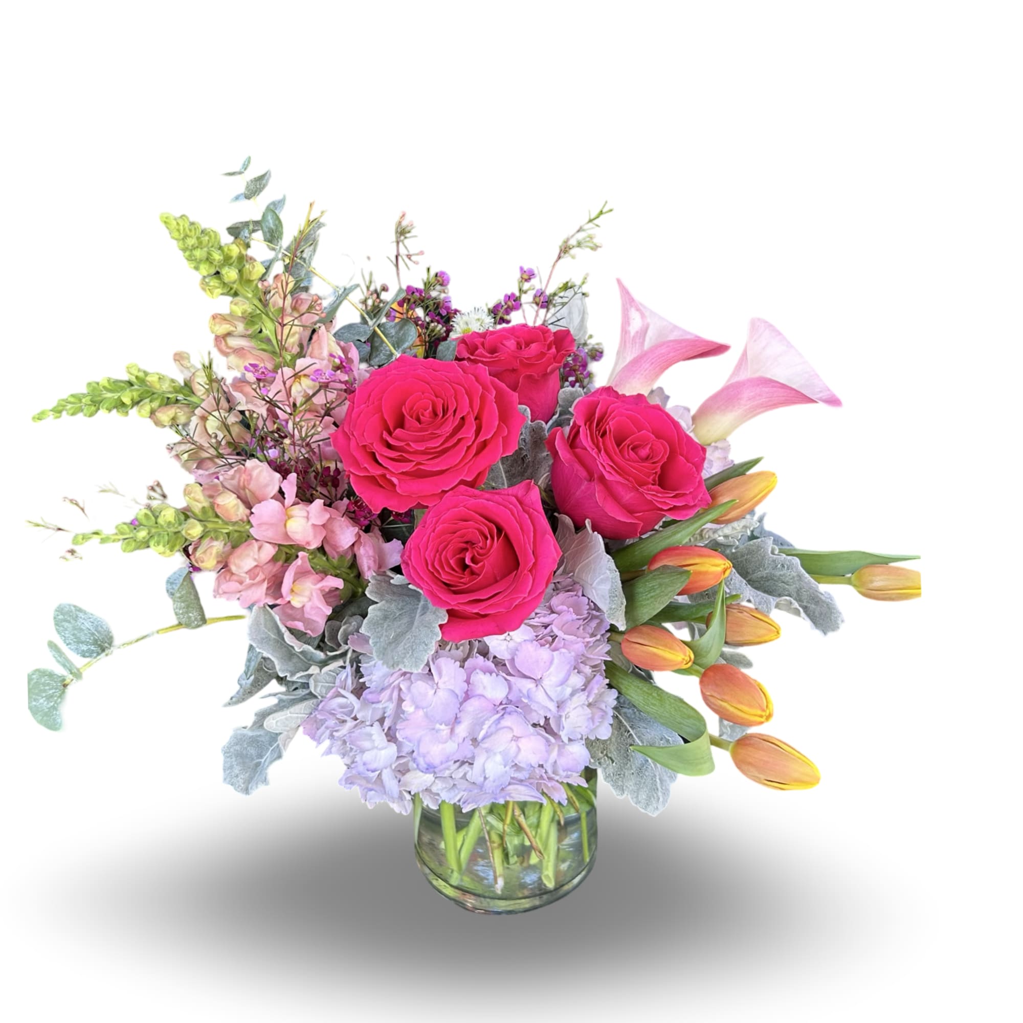Vivid hot-pink roses crown a cloud of lavender hydrangeas in this joyful, photo 3 of 3