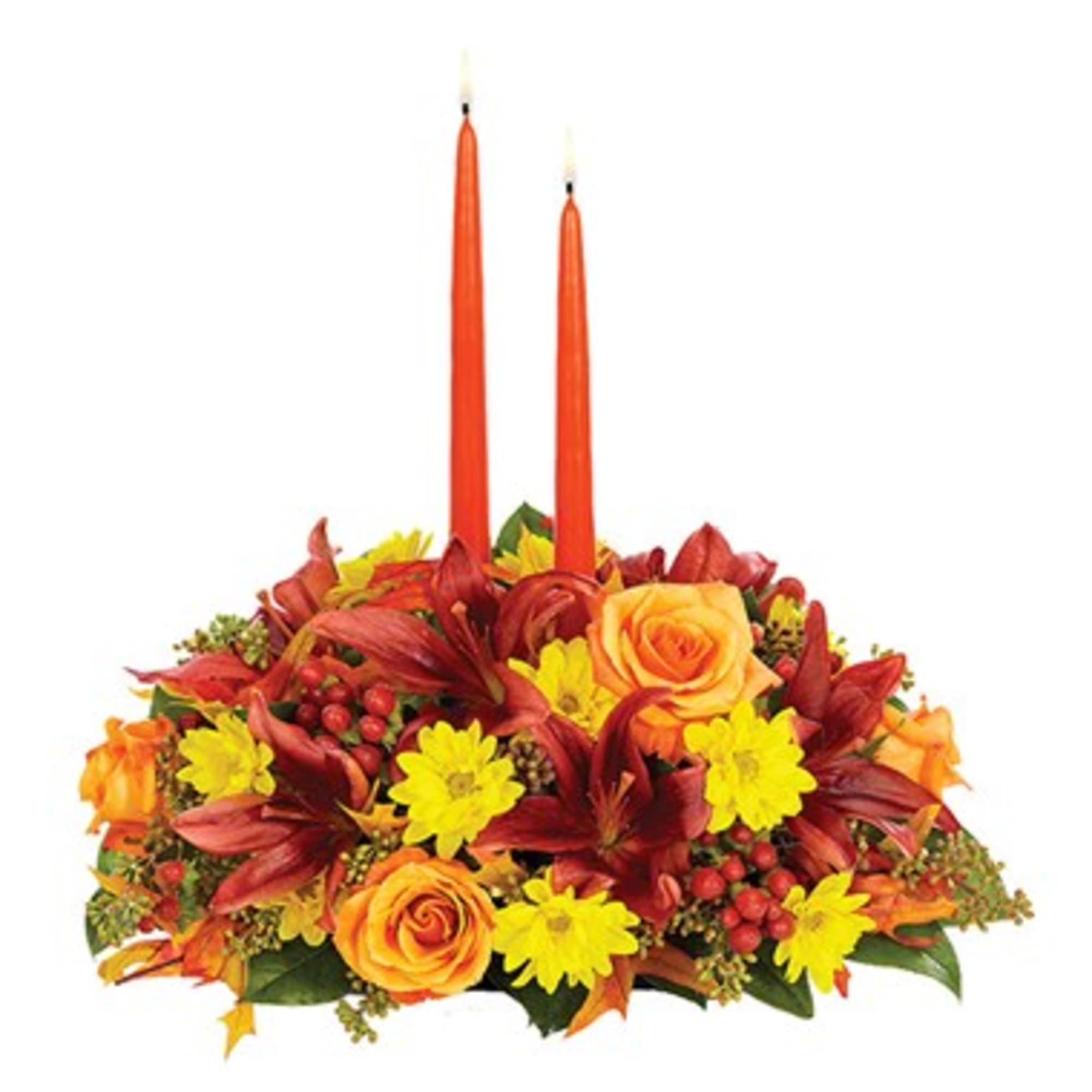 Autumn floral centerpiece with two orange taper candles