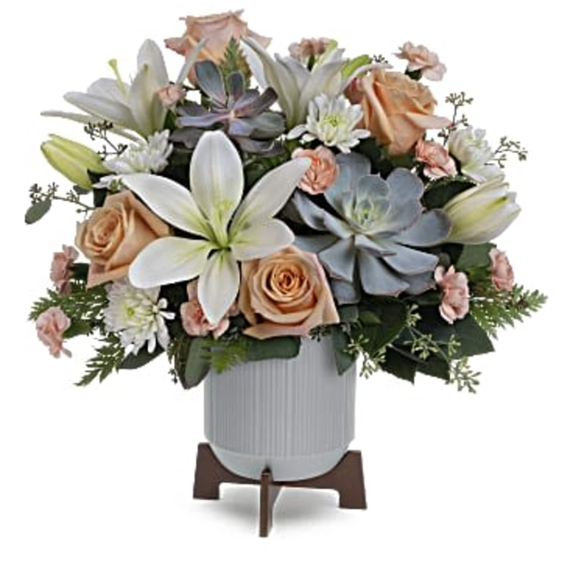 Sleek meets sweet! This modern arrangement pairs a sculptural succulent with soft
