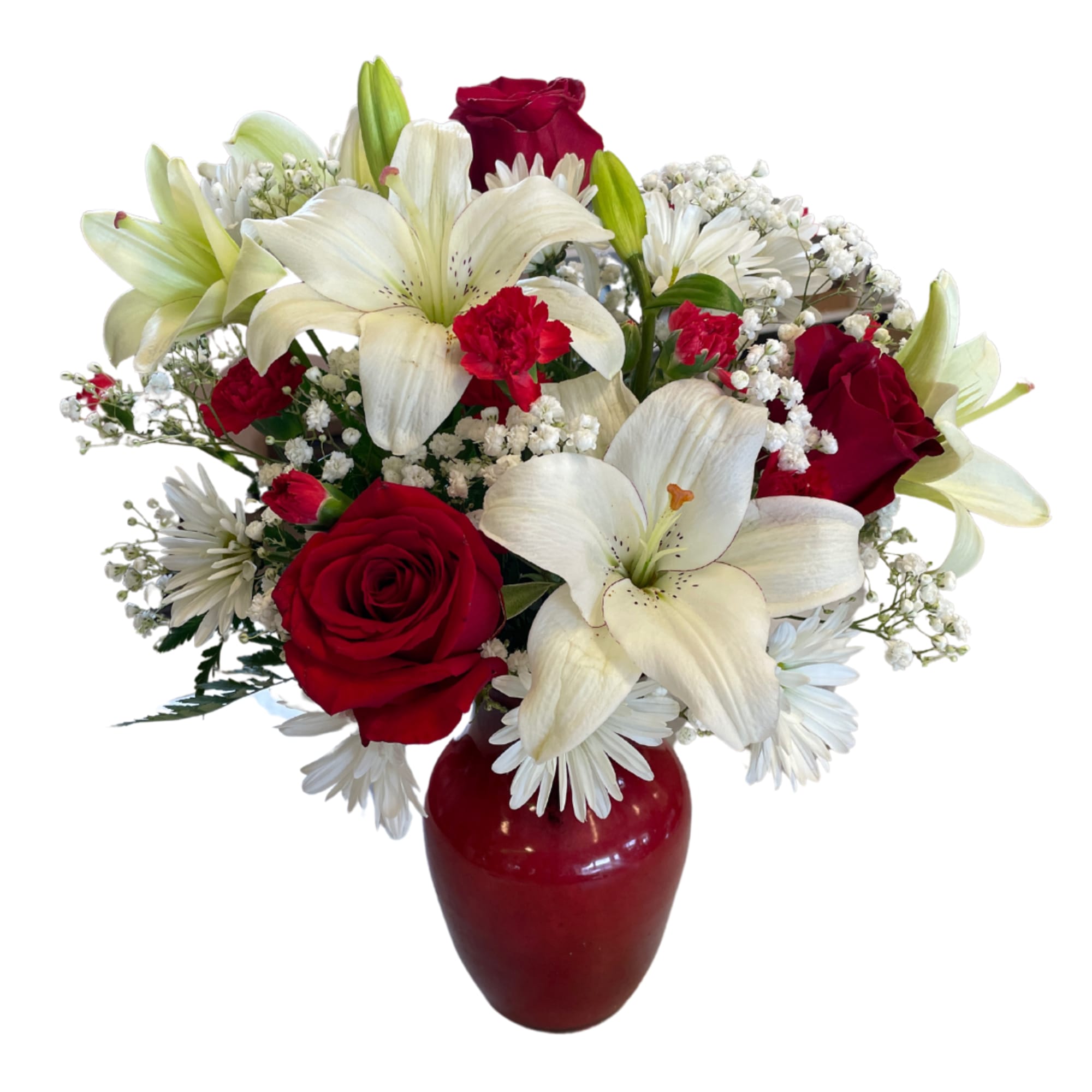 Red roses and white lilies in a red vase