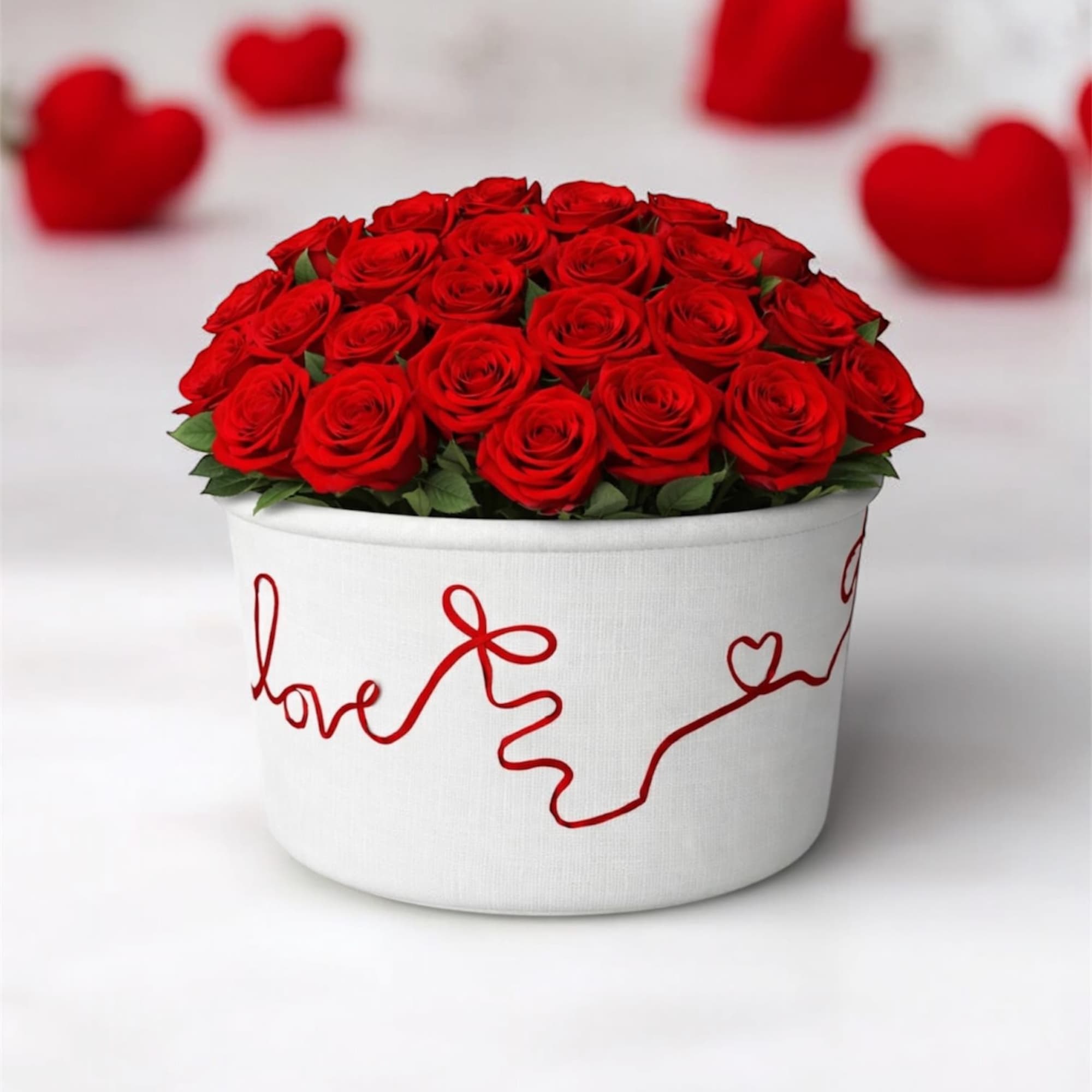 Thirty-six red roses with impeccable stems, individually selected and arranged in a