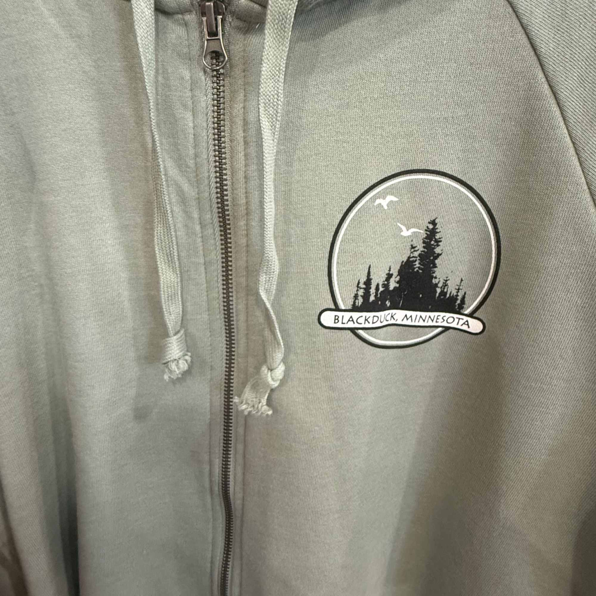 Gray zip-up hoodie with a Blackduck, Minnesota patch on the chest