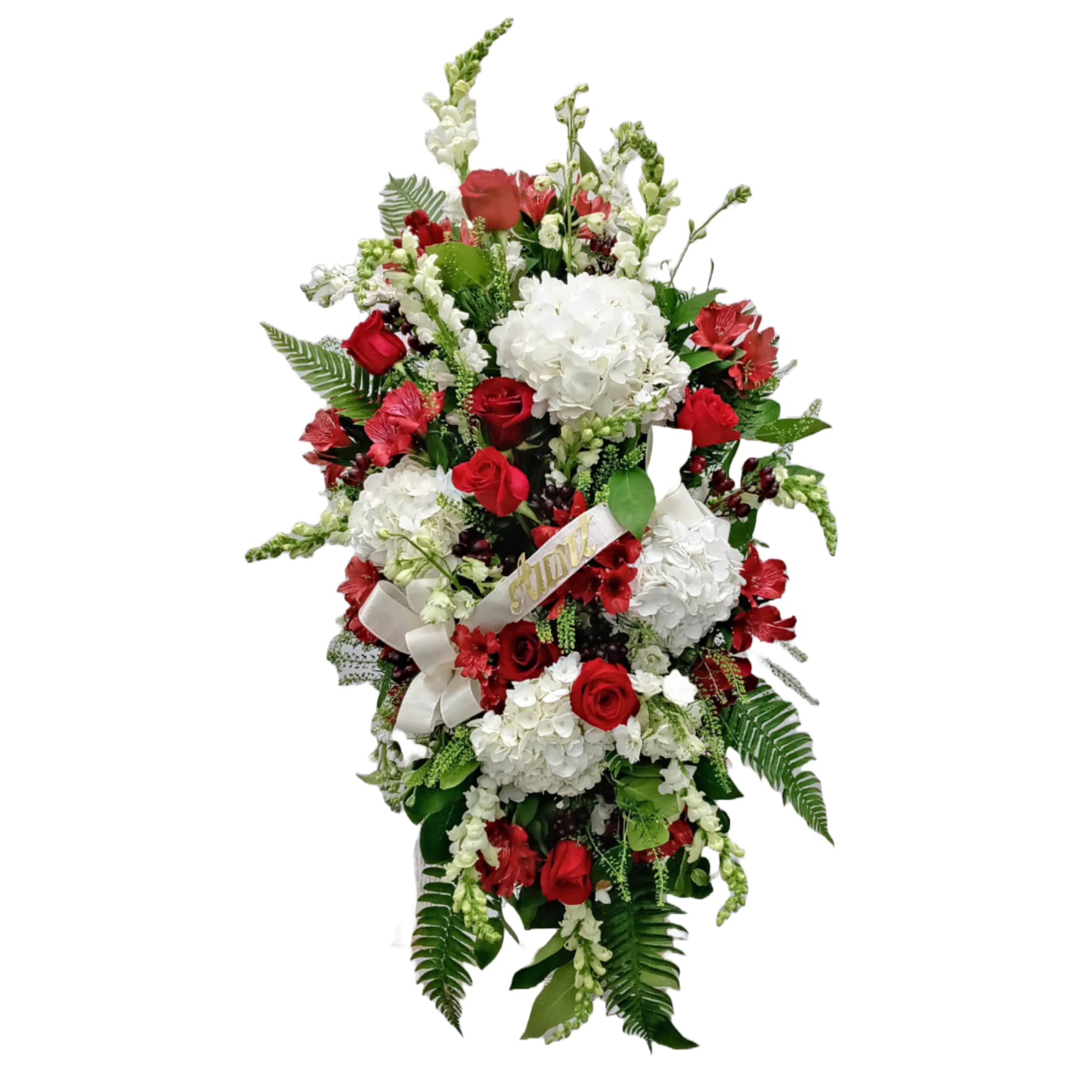 Tall red and white standing floral spray with roses, hydrangeas, snapdragons, ferns, and a white ribbon.