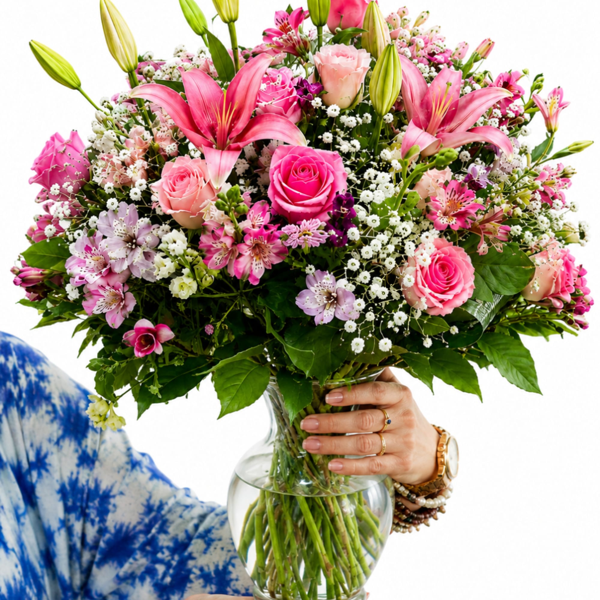 Large pink and white mixed bouquet in a clear glass vase